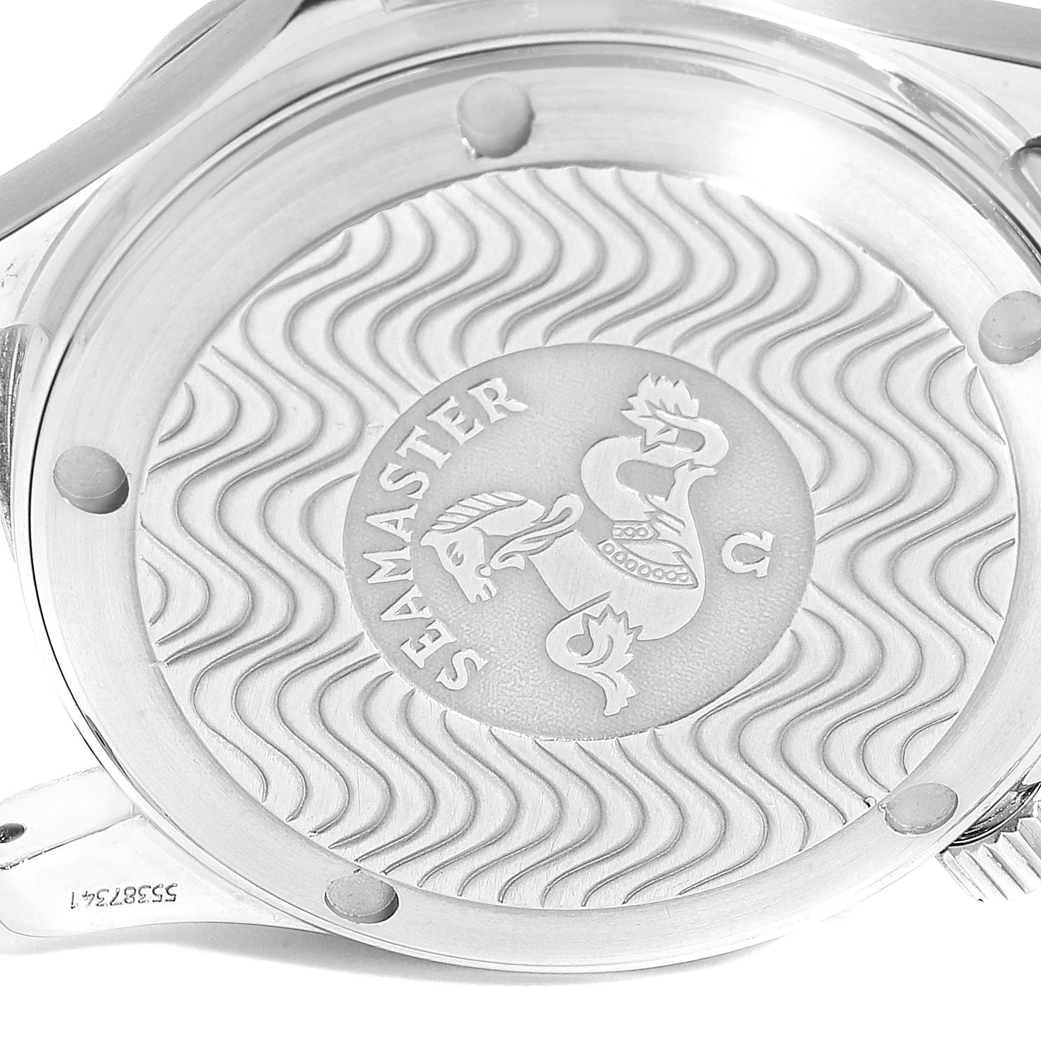 The image shows the back (caseback) of an Omega Seamaster 2561.80.00 Men
s Stainless Steel Blue Dial 2561.80.00 Men
s Stainless Steel Blue Dial watch, displaying its wavy design and engraved logo.