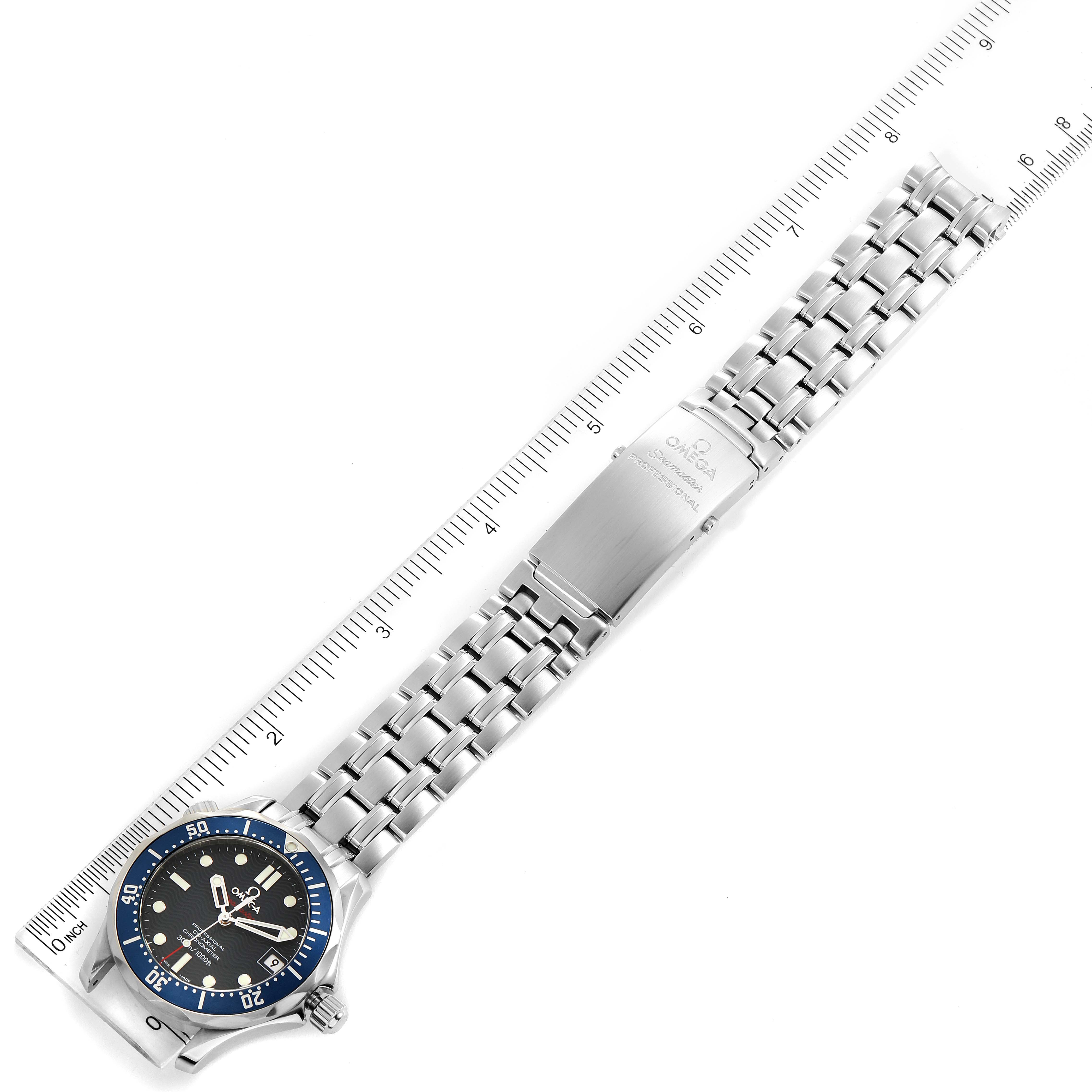 The on-top view shows the face, bezel, and full bracelet of the Omega Seamaster 2222.80.00 Men's Stainless Steel Blue Dial 2222.80.00 Men's Stainless Steel Blue Dial watch with a measuring ruler.