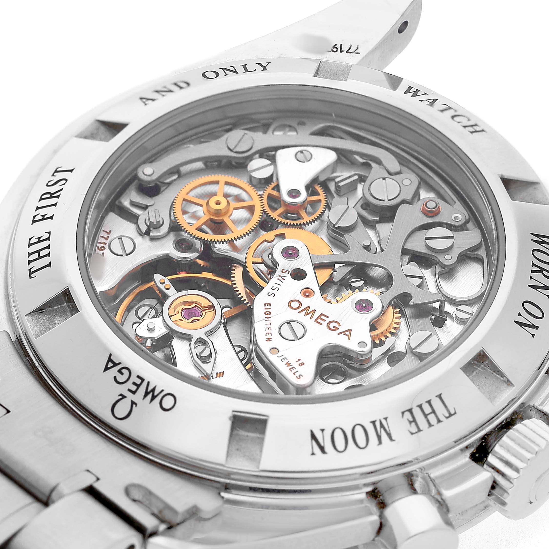 The image shows the back of an Omega Speedmaster 311.30.42.30.13.001 Men's Stainless Steel Brown Dial, highlighting its intricate mechanical movement through a transparent case back.