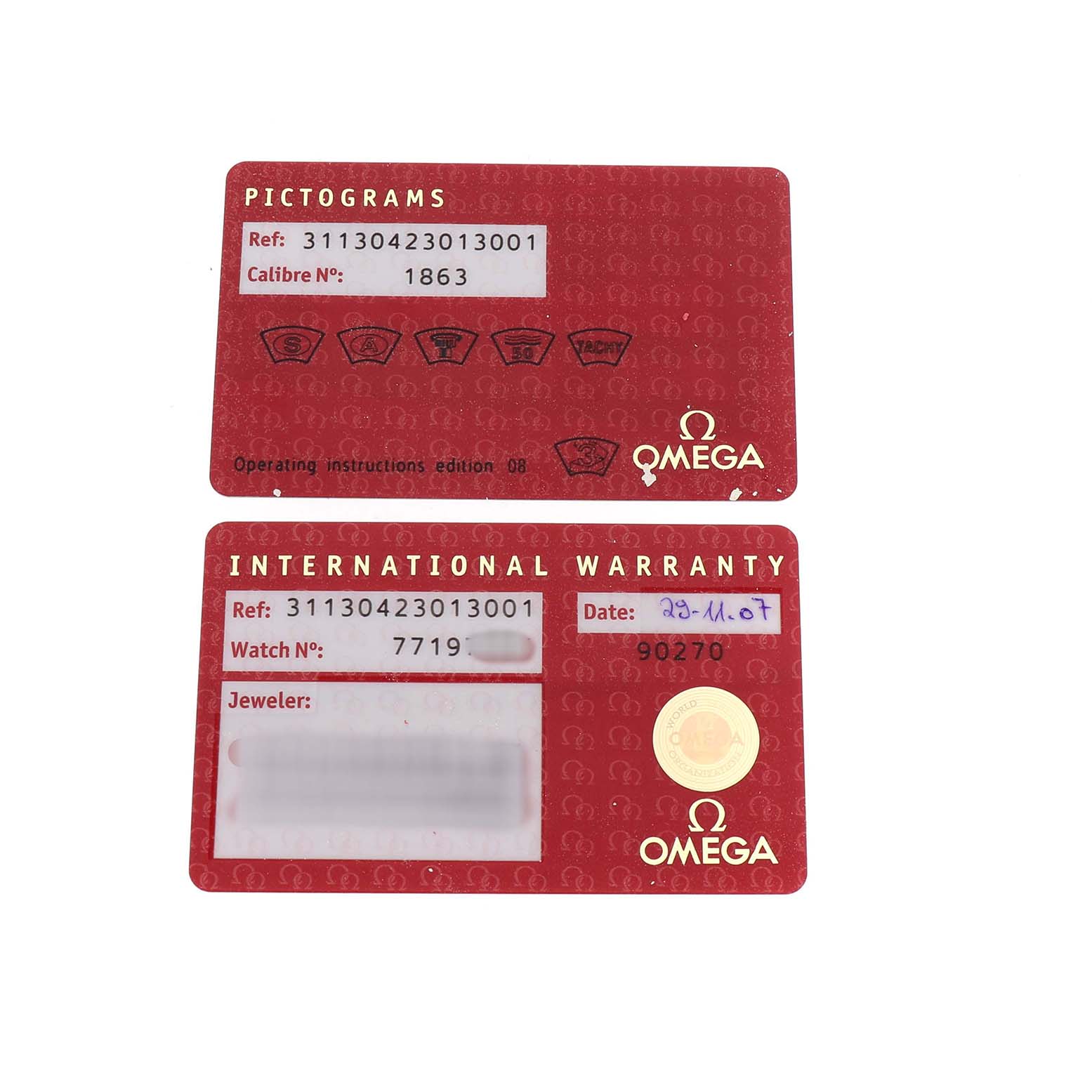 The image shows Omega Speedmaster 311.30.42.30.13.001 Men's Stainless Steel Brown Dial international warranty and pictogram cards, viewed from above.