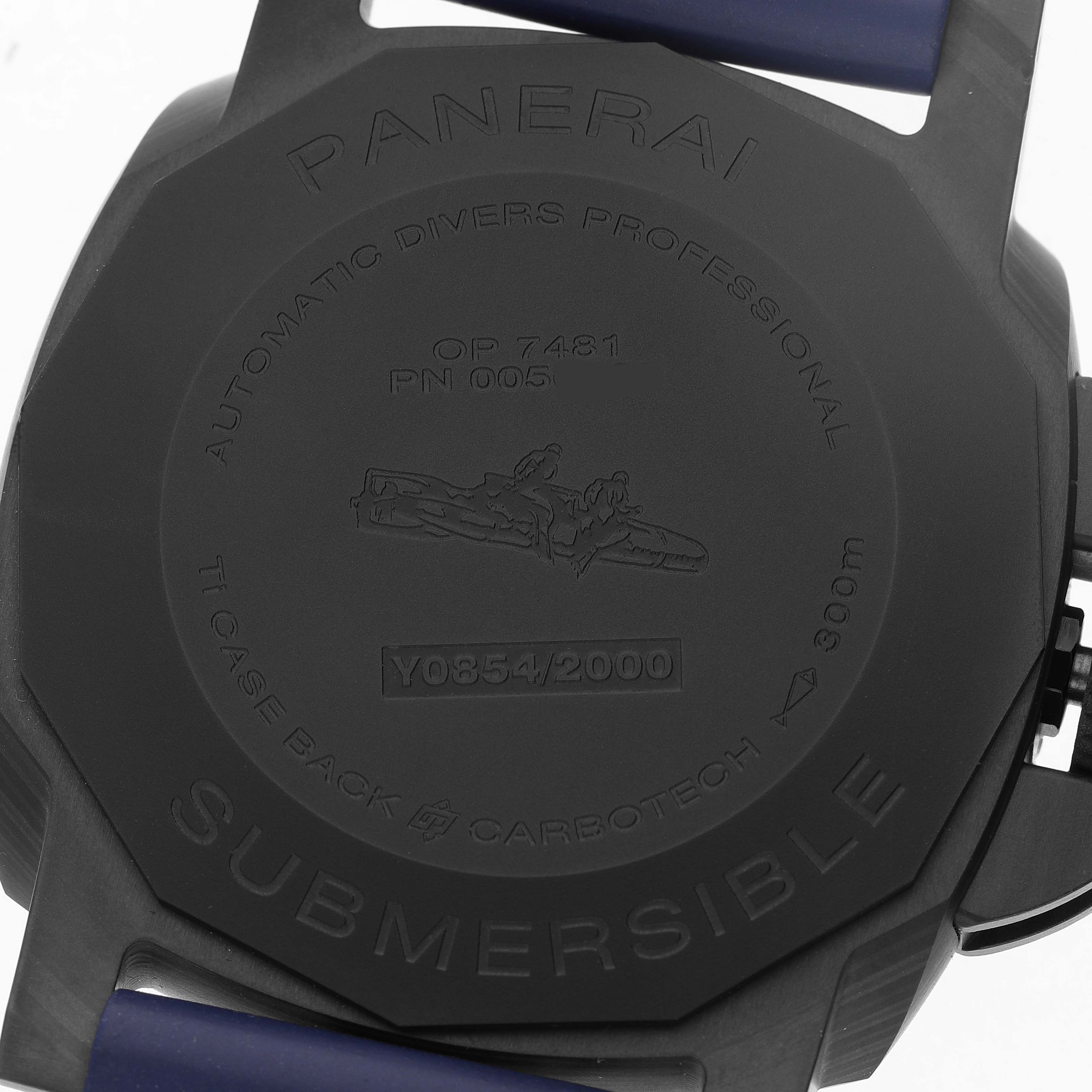 The image shows the back of a Panerai Submersible PAM01232 Men's Ceramic Blue Dial watch, highlighting engravings and the strap attachment.