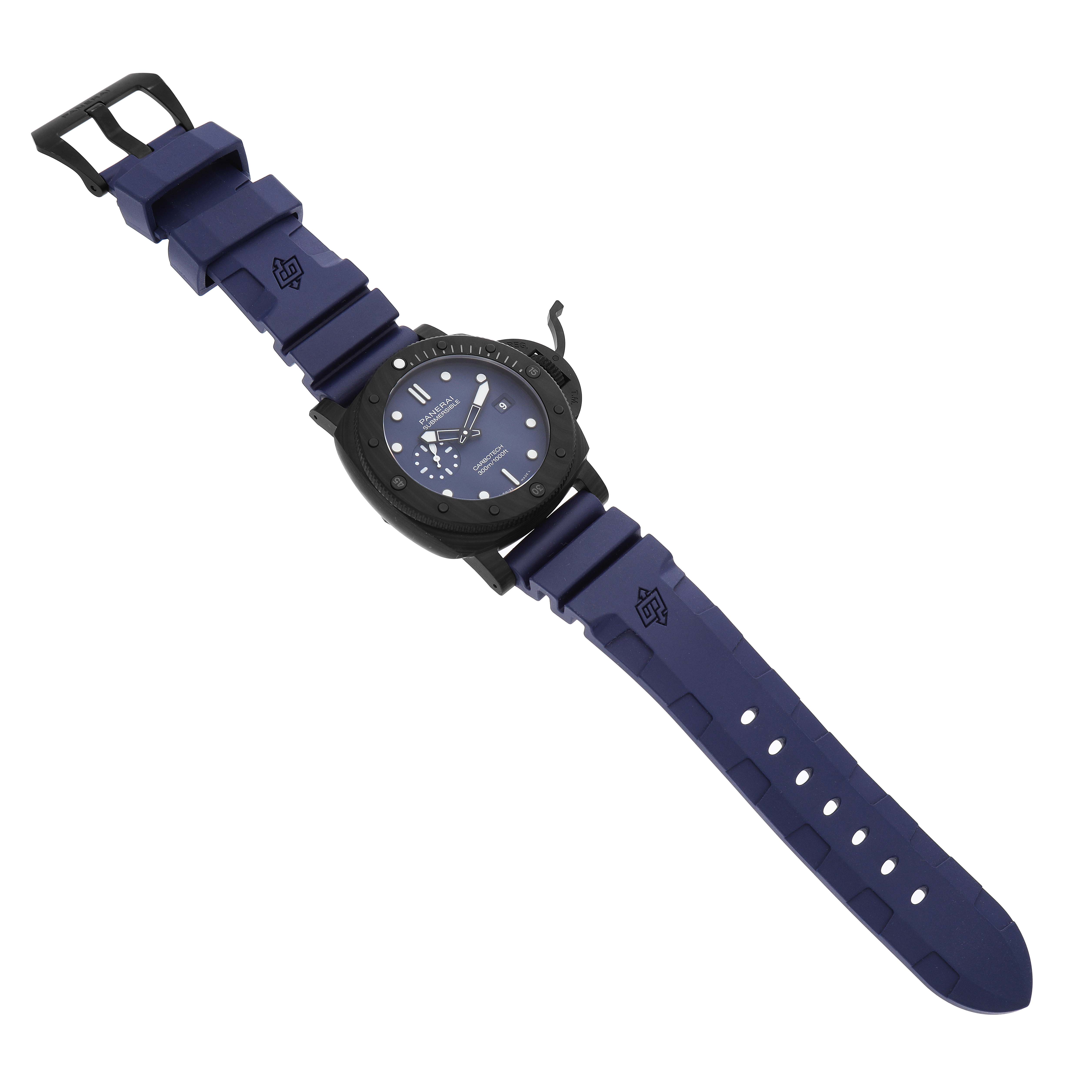 The Panerai Submersible PAM01232 Men's Ceramic Blue Dial watch is shown from an angled top view, displaying the face, bezel, and blue rubber strap.