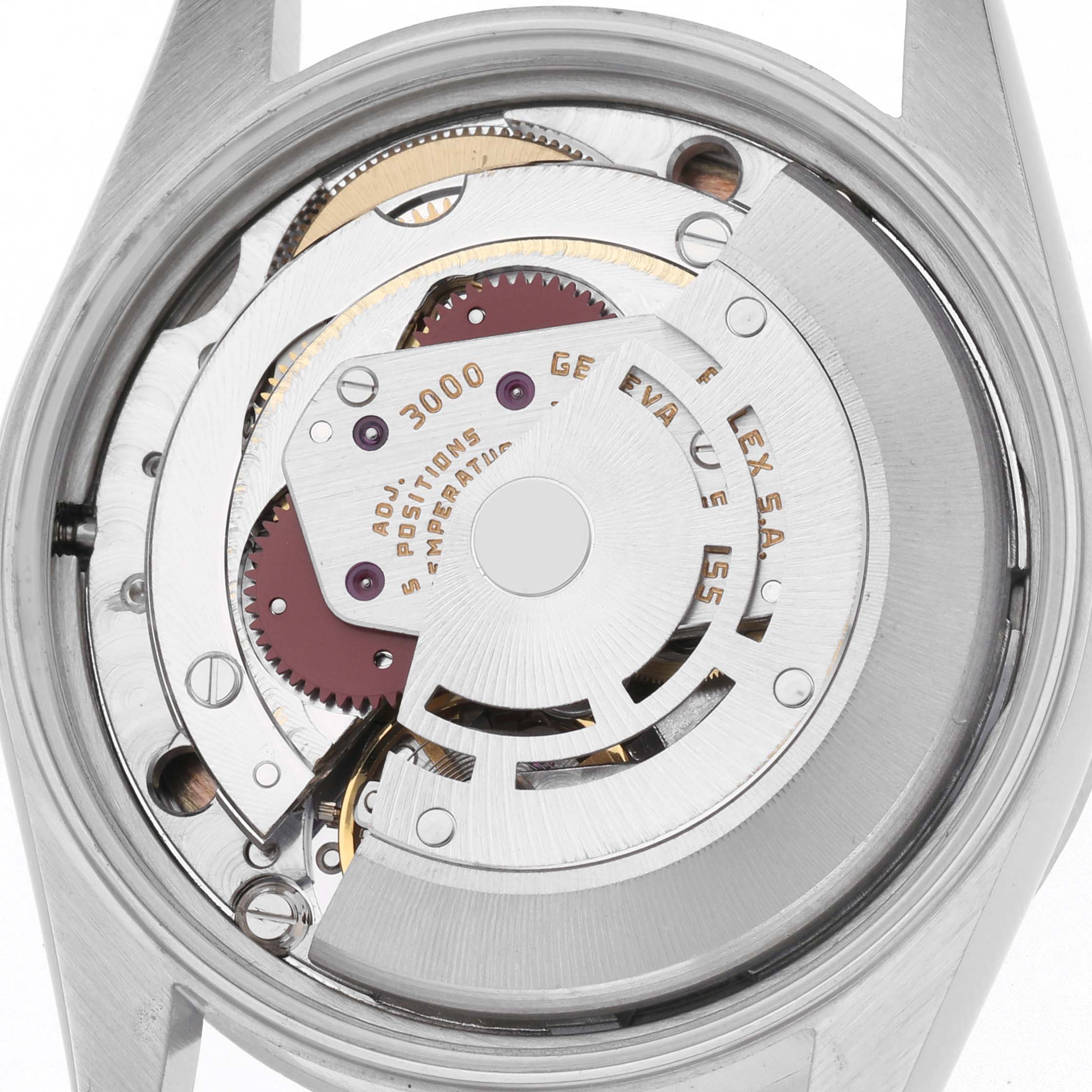 The image shows the back view of a Rolex Air-King 14010 Men's Stainless Steel Silver Dial 14010 Men's Stainless Steel Silver Dial watch, revealing its internal mechanical movement.