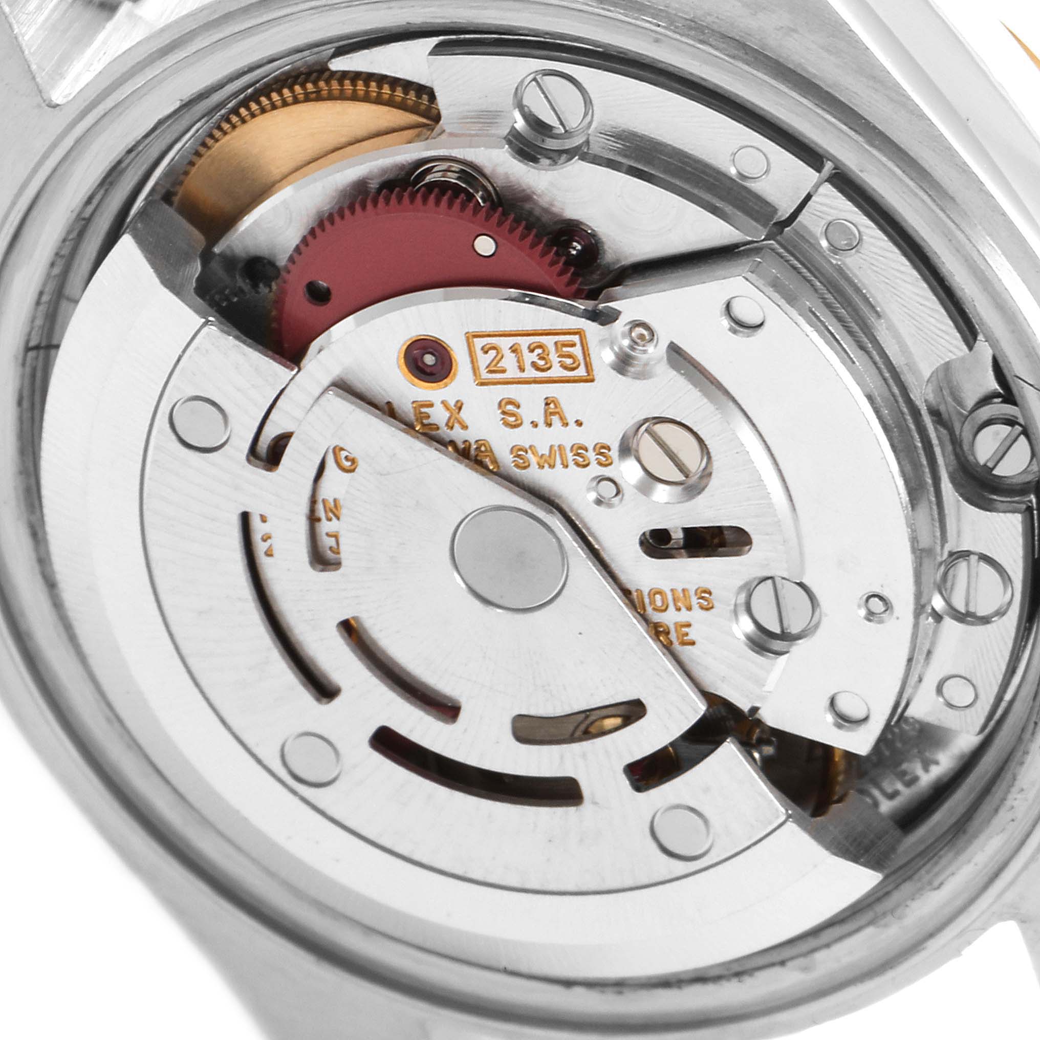 This image shows an angled close-up view of the movement and inner components of a Rolex Datejust 69173 Women's Steel and Gold (two tone) Black Dial 69173 Women's Steel and Gold (two tone) Black Dial watch.