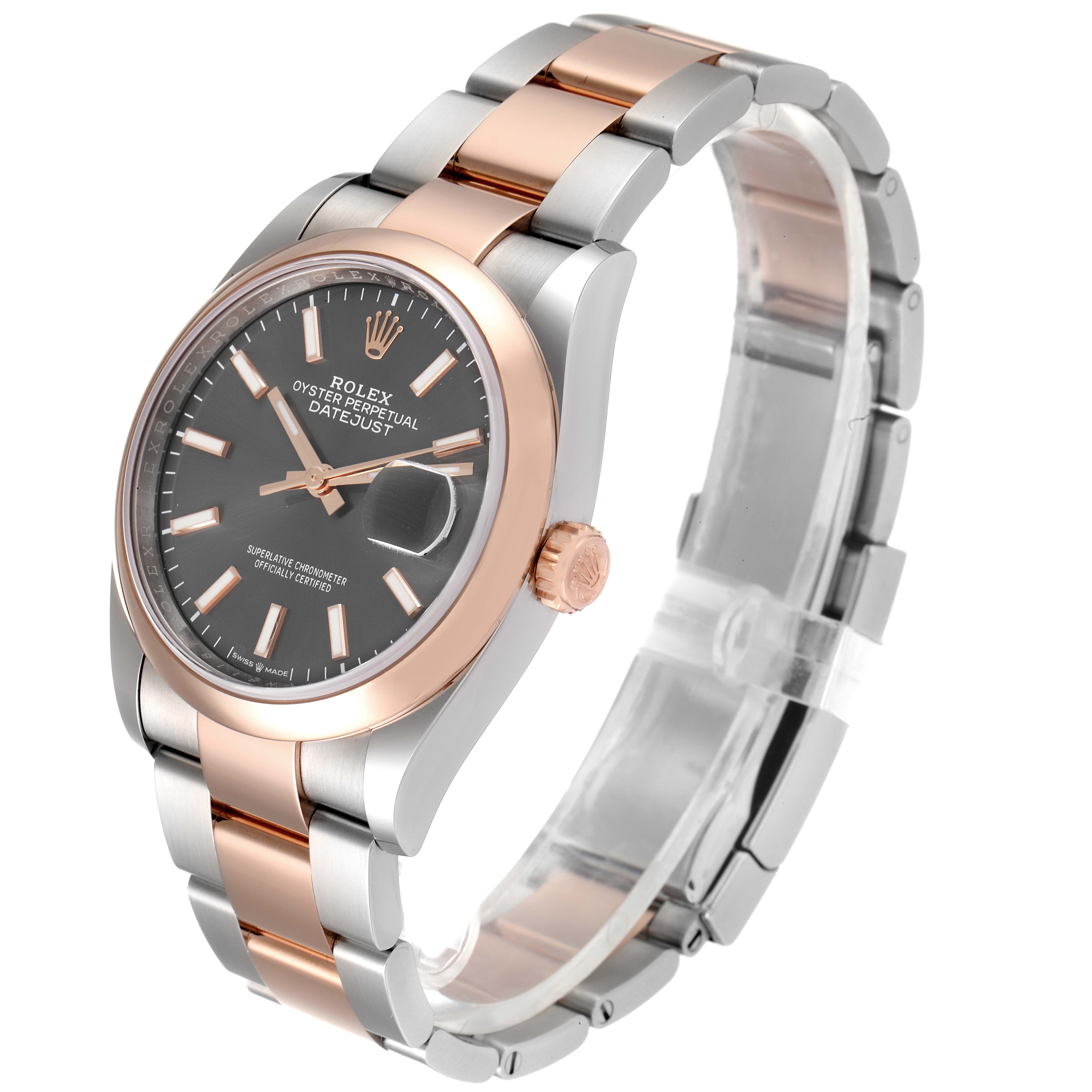 The image shows a Rolex Datejust 116201 Men
s Steel and Gold (two tone) Grey Dial 116201 Men
s Steel and Gold (two tone) Grey Dial watch at a tilted angle, highlighting the face, bezel, crown, and bracelet.