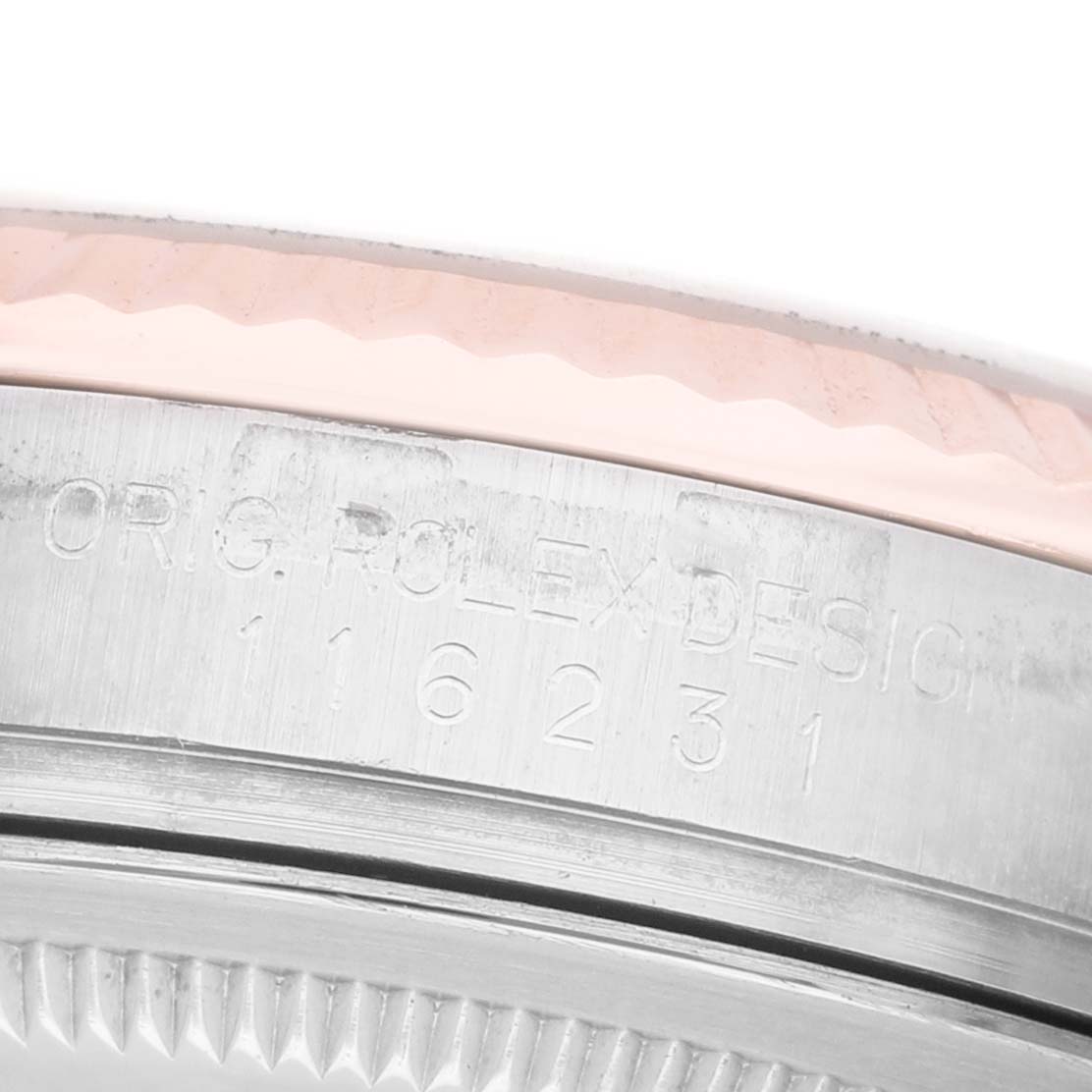 The image shows a close-up of the side engravings on the Rolex Datejust 116231 Men's Stainless Steel Silver Dial watch case.