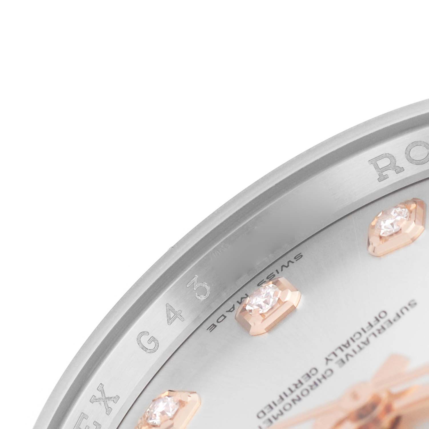 The image shows a close-up of the dial and bezel edge of a Rolex Datejust 116231 Men's Stainless Steel Silver Dial, highlighting the engraving and diamond hour markers.