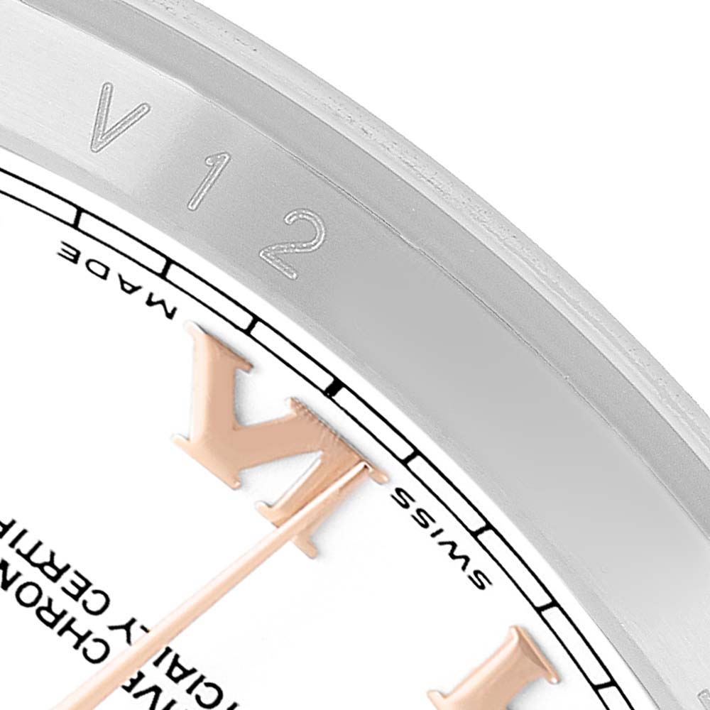The image shows a close-up of the bezel and dial edge of a Rolex Datejust 116201 Men's Stainless Steel White Dial watch, highlighting the engraving and Roman numeral.