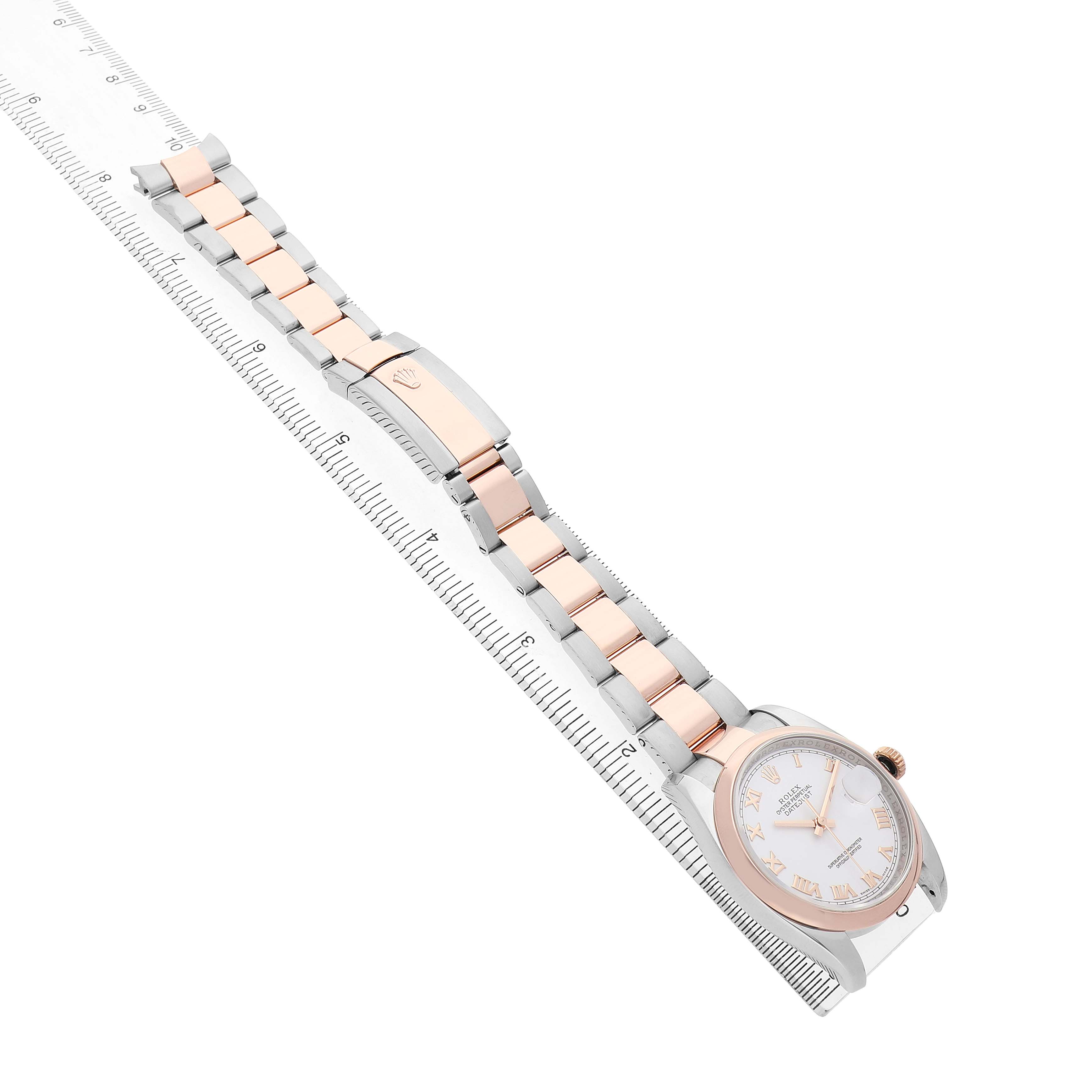 The Rolex Datejust 116201 Men's Stainless Steel White Dial watch is shown at an angle highlighting the full bracelet and clasp, with the face partially visible.