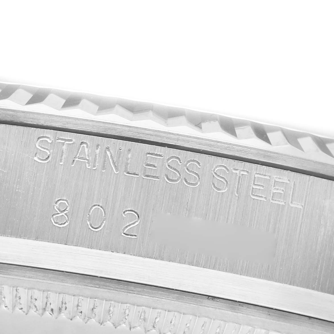 The image shows a close-up of the Rolex Datejust 16014 Men's Stainless Steel Silver Dial's case edge, highlighting the stainless steel material and part of the bezel.