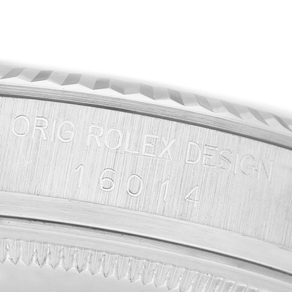 The image shows a close-up of the case side of a Rolex Datejust 16014 Men's Stainless Steel Silver Dial, highlighting the engraved design and reference number "16014".