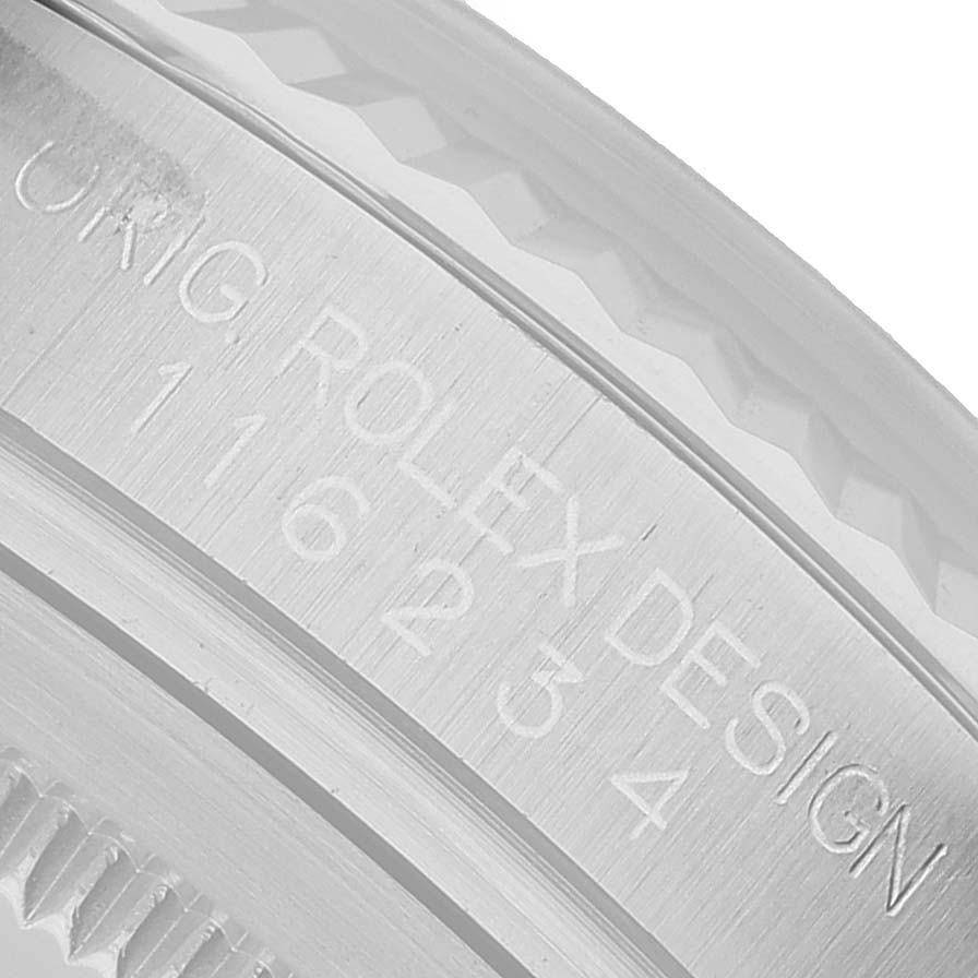 The image shows a close-up of the inner bezel with engraved text on a Rolex Datejust 116234 Men's Stainless Steel Silver Dial watch.