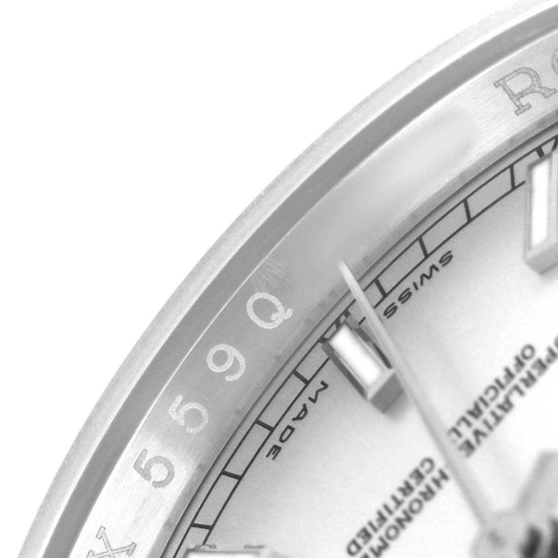 The image shows a close-up of the dial and bezel of a Rolex Datejust 116234 Men's Stainless Steel Silver Dial watch, focusing on the edge details.
