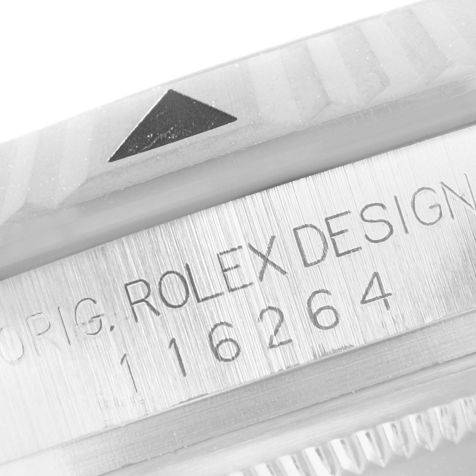 This image shows a close-up of the bezel and serial number engraving of the Rolex Turn-o-Graph 116264 Men
s Stainless Steel Black Dial 116264 Men
s Stainless Steel Black Dial watch.