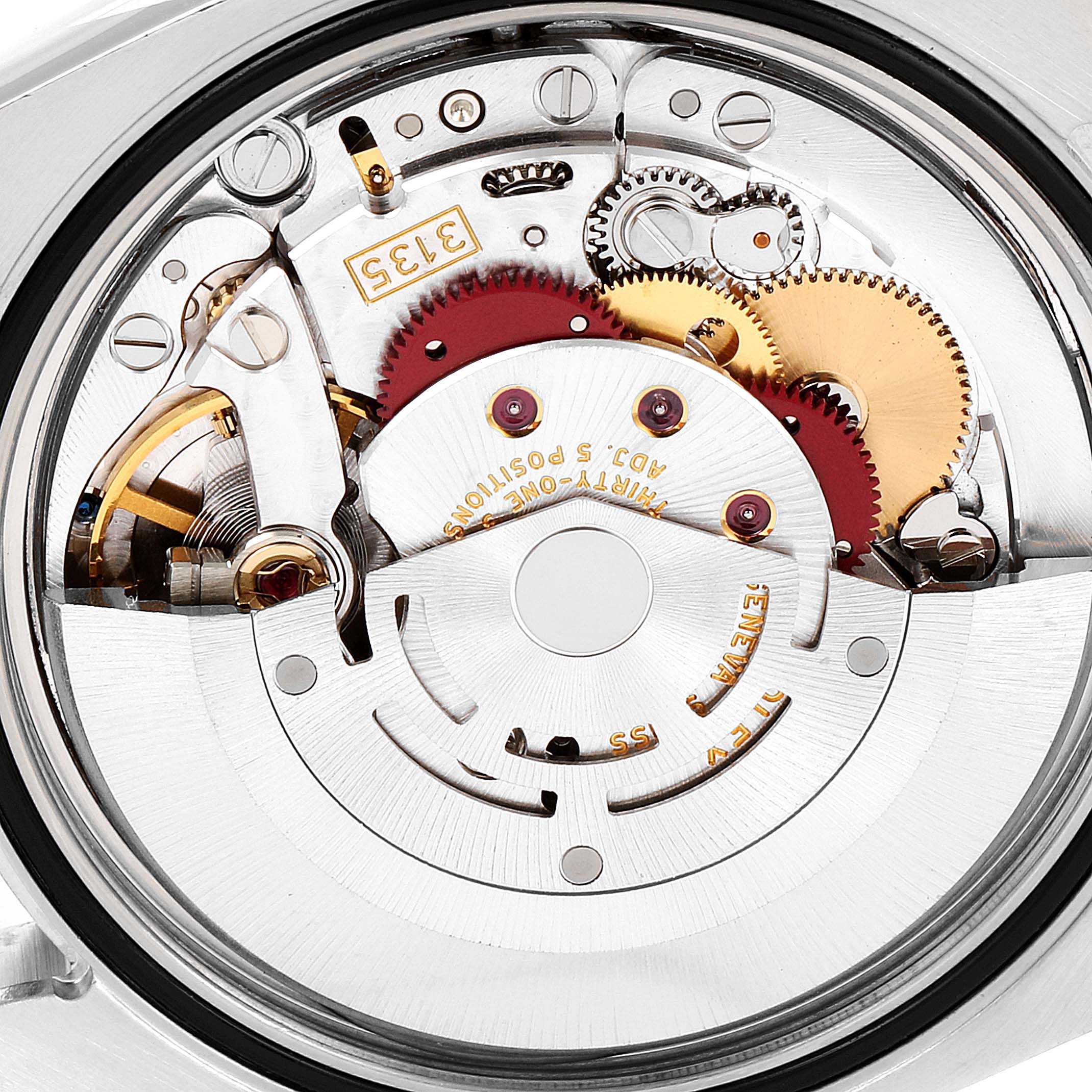 The image shows the detailed inner mechanism of a Turn-o-Graph model by Rolex, viewed from the back.
