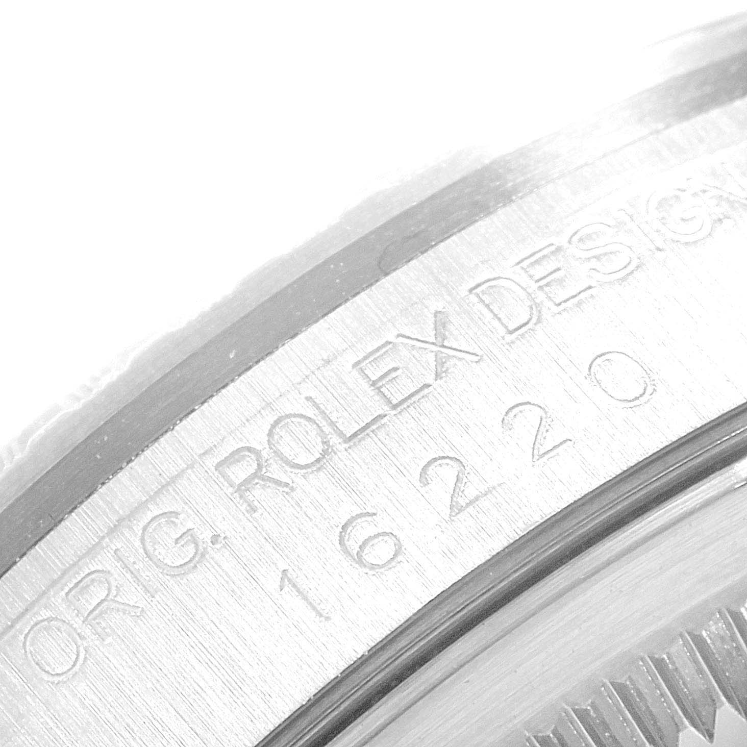 The close-up image shows the engraved side/edge of the Rolex Datejust 16220 Men's Stainless Steel Black Dial 16220 Men's Stainless Steel Black Dial model, highlighting "ORIG. ROLEX DESIGN" and the model number.