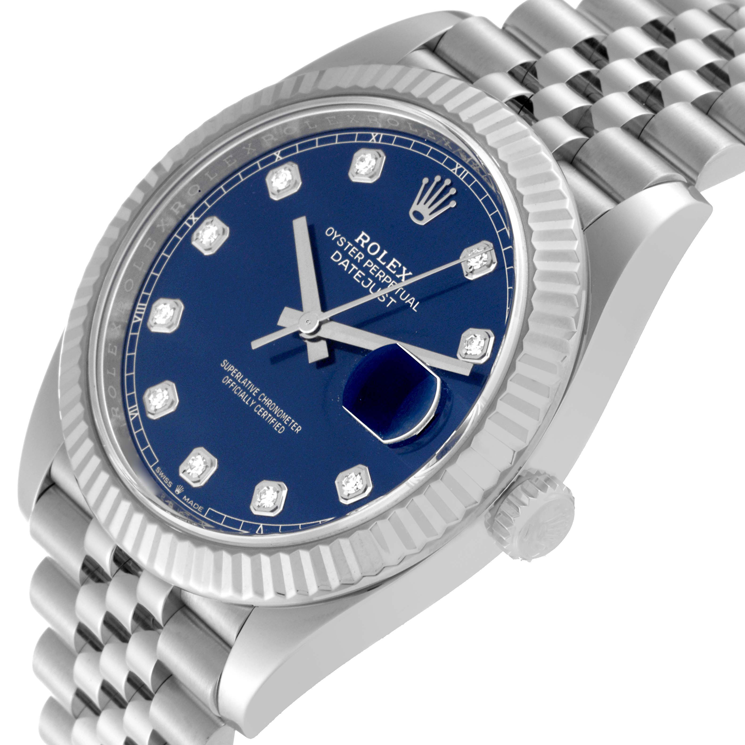 The image shows a close-up, angled view of the Rolex Datejust 41 126334 Men
s Stainless Steel Blue Dial 126334 Men
s Stainless Steel Blue Dial watch with a blue dial, bezel, and part of the bracelet.