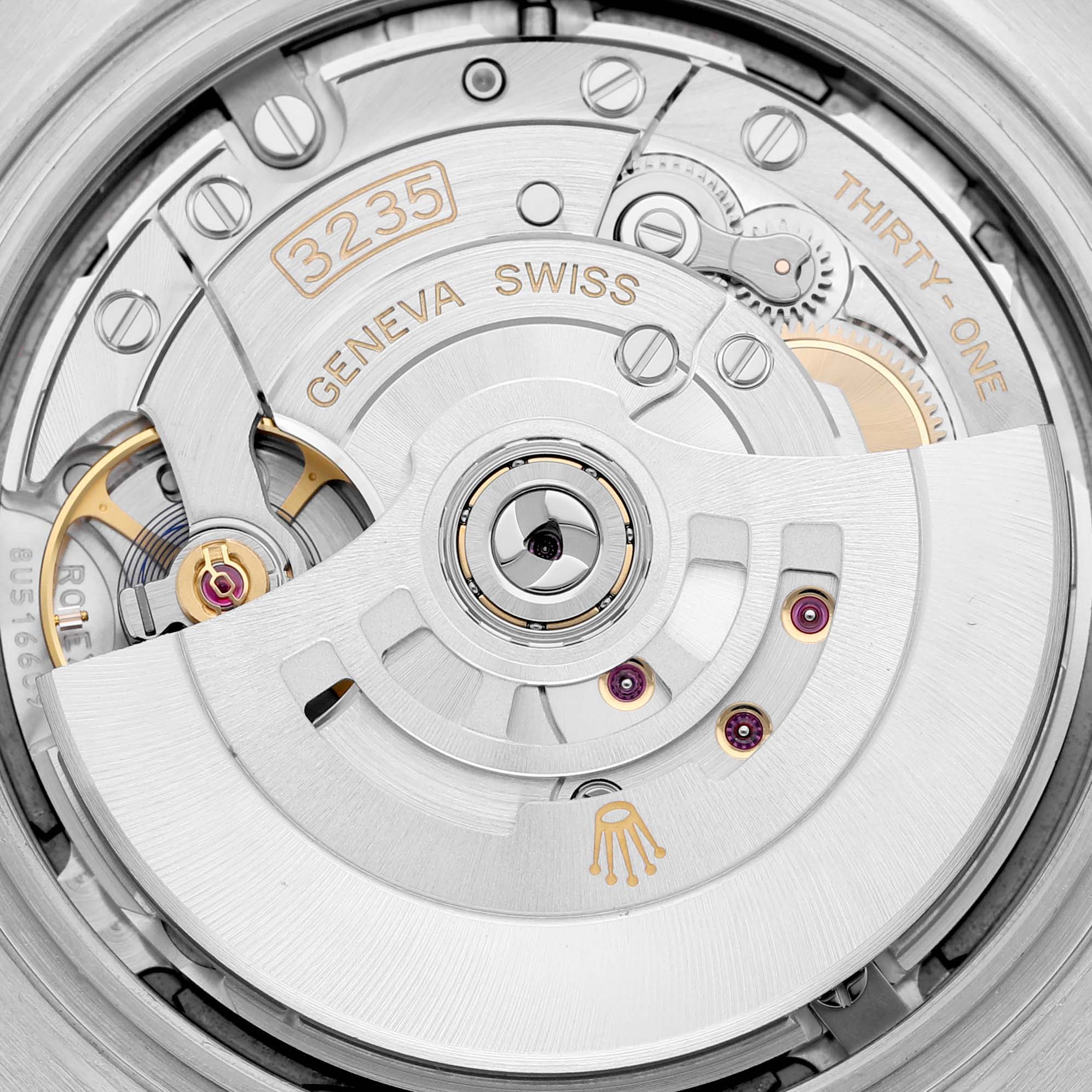 The image shows a close-up view of the movement and inner mechanism of the Rolex Datejust 41 126334 Men
s Stainless Steel Blue Dial 126334 Men
s Stainless Steel Blue Dial, highlighting the 3235 caliber.