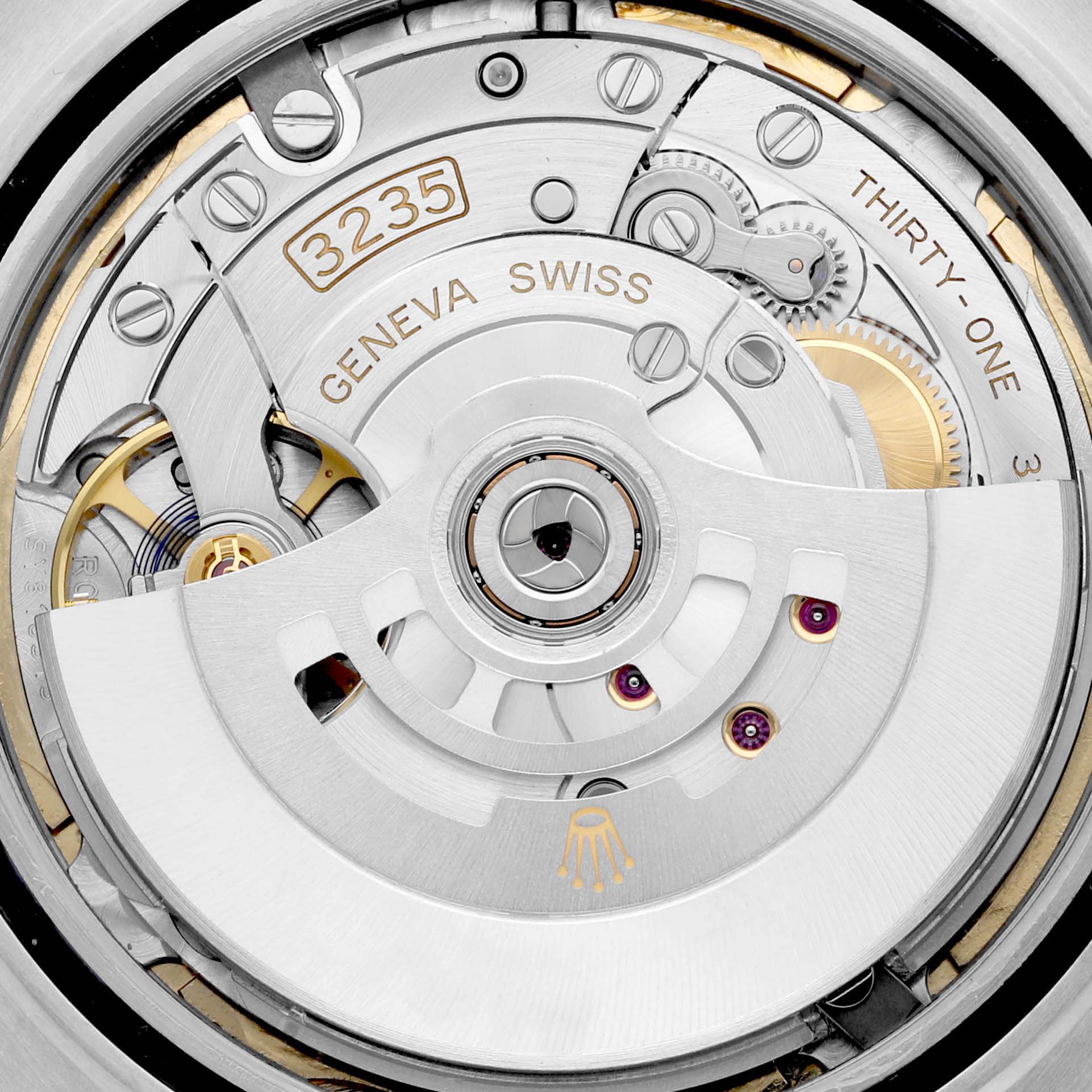 This image shows the intricate inner workings of the Rolex Datejust 41 126333 Men's Steel and Gold (two tone) Champagne Dial 126333 Men's Steel and Gold (two tone) Champagne Dial, featuring its movement components up close.