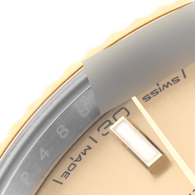 The image shows a close-up of the dial and date of the Rolex Datejust 41 126333 Men's Steel and Gold (two tone) Champagne Dial 126333 Men's Steel and Gold (two tone) Champagne Dial model.