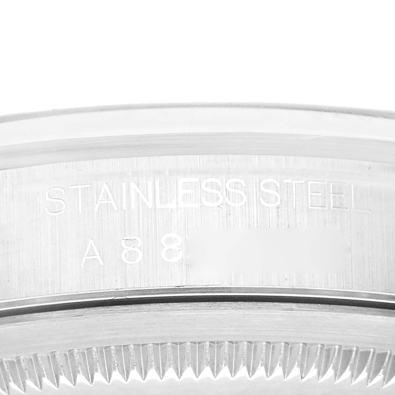 This image shows a close-up view of the side of the Rolex Datejust 16200 Men's Stainless Steel Blue Dial 16200 Men's Stainless Steel Blue Dial watch, highlighting the stainless steel engraving and bezel edge.