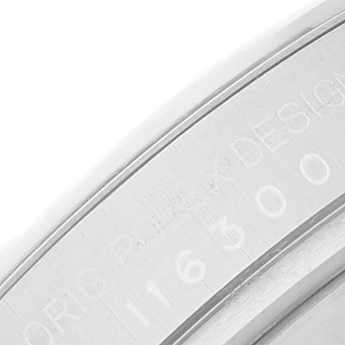 The image shows a close-up of the rehaut engraving on a Rolex Datejust 41 116300 Men's Stainless Steel Blue Dial 116300 Men's Stainless Steel Blue Dial model.