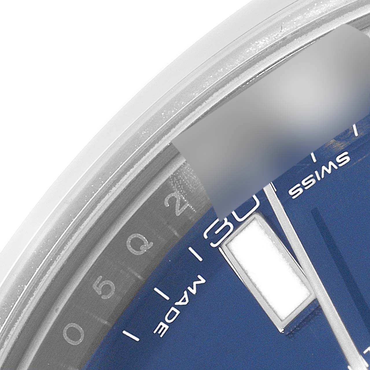 The image shows a close-up of the Datejust 41 Rolex watch, specifically the date display, part of the dial, and the edge of the bezel.