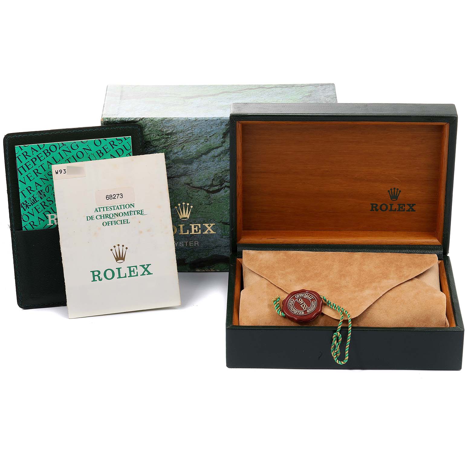 The image shows the packaging and accessories for a Rolex Mid-Size 68273 Women
s Steel and Gold (two tone) White Dial 68273 Women
s Steel and Gold (two tone) White Dial model from a front angle, including the box, instruction manual, and a sealed pouch.