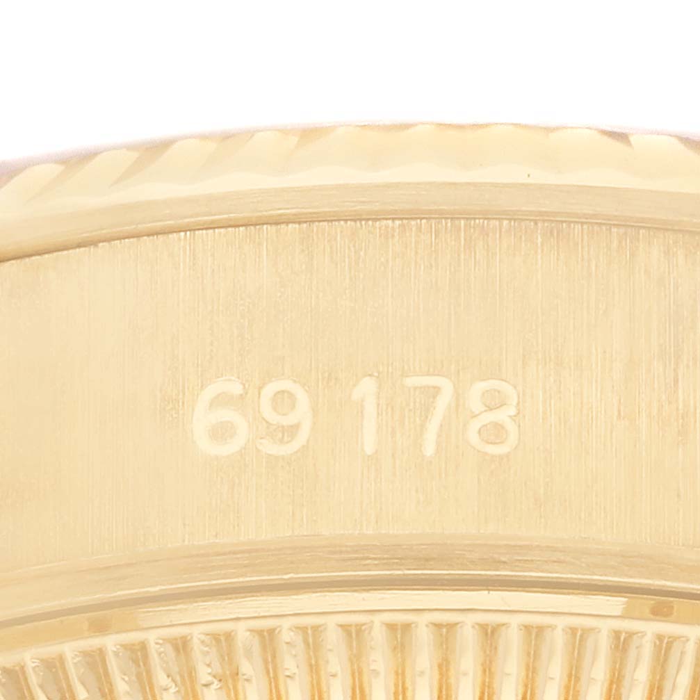 This image shows a close-up angle of the side of a Rolex President 69178 Women's Yellow Gold White Dial 69178 Women's Yellow Gold White Dial model watch, focusing on the reference number 69178.