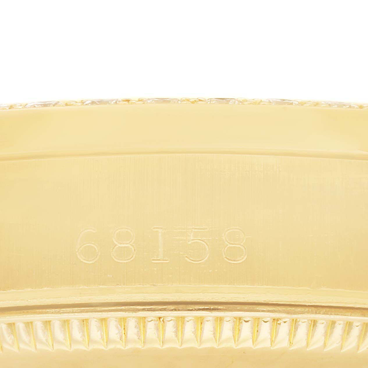 The image shows a close-up of the engraved case back numbers (68158) and part of the bezel on a Rolex President 68158 Women's Yellow Gold Champagne Dial 68158 Women's Yellow Gold Champagne Dial model watch.
