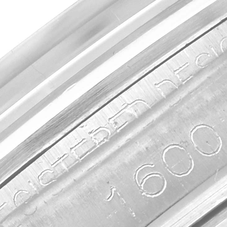 This close-up image shows the engraved details on the inner bezel of a Rolex Vintage Collection 1600 Men's Stainless Steel Grey Dial 1600 Men's Stainless Steel Grey Dial watch.