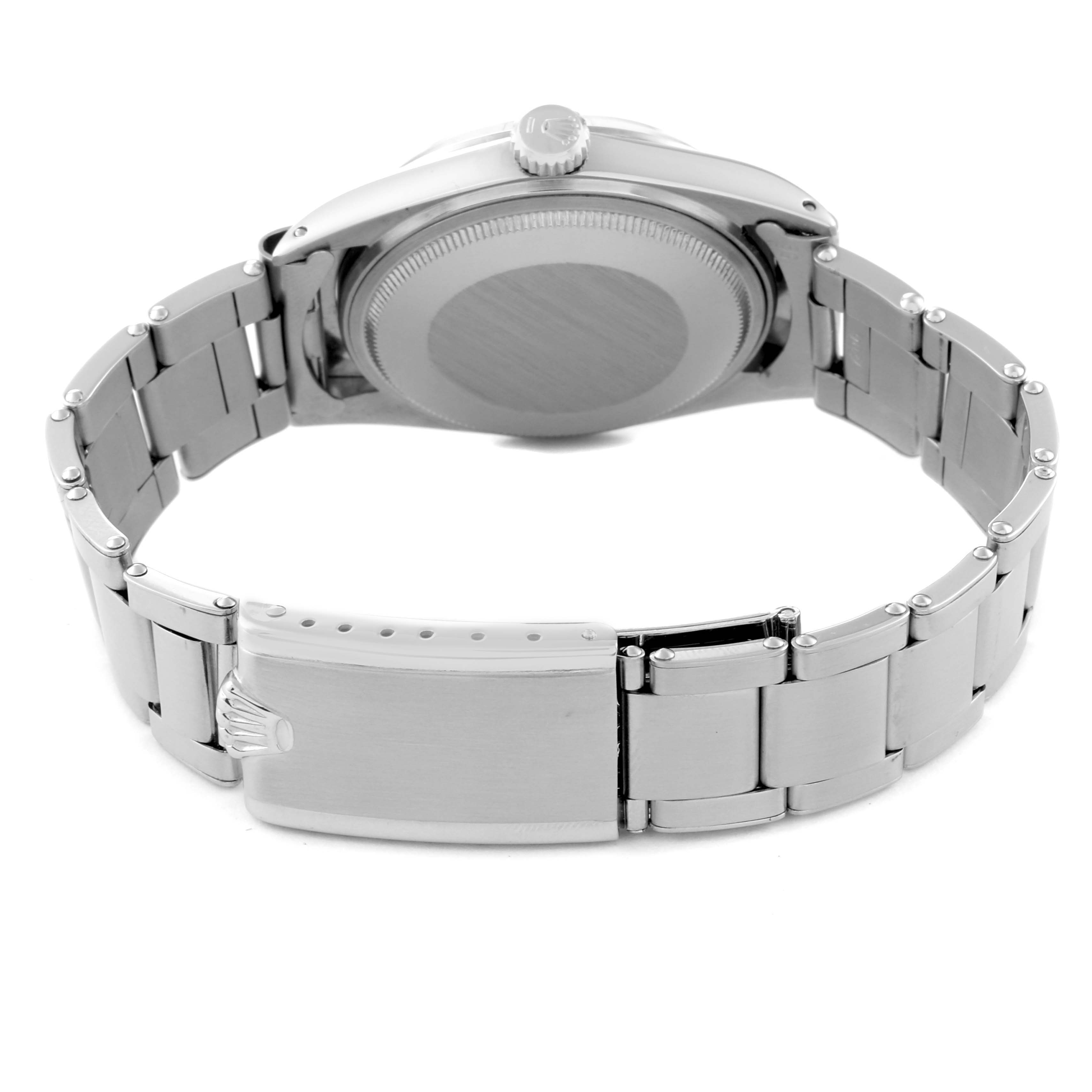 This image shows the back view of the Vintage Collection Rolex watch, highlighting its clasp and bracelet.