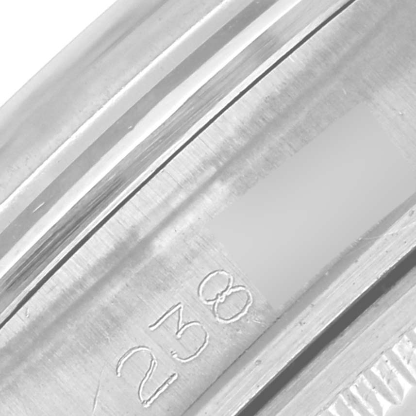 The image shows a close-up of the engravings on the inner rim of a Rolex Vintage Collection 1600 Men's Stainless Steel Grey Dial 1600 Men's Stainless Steel Grey Dial model watch.