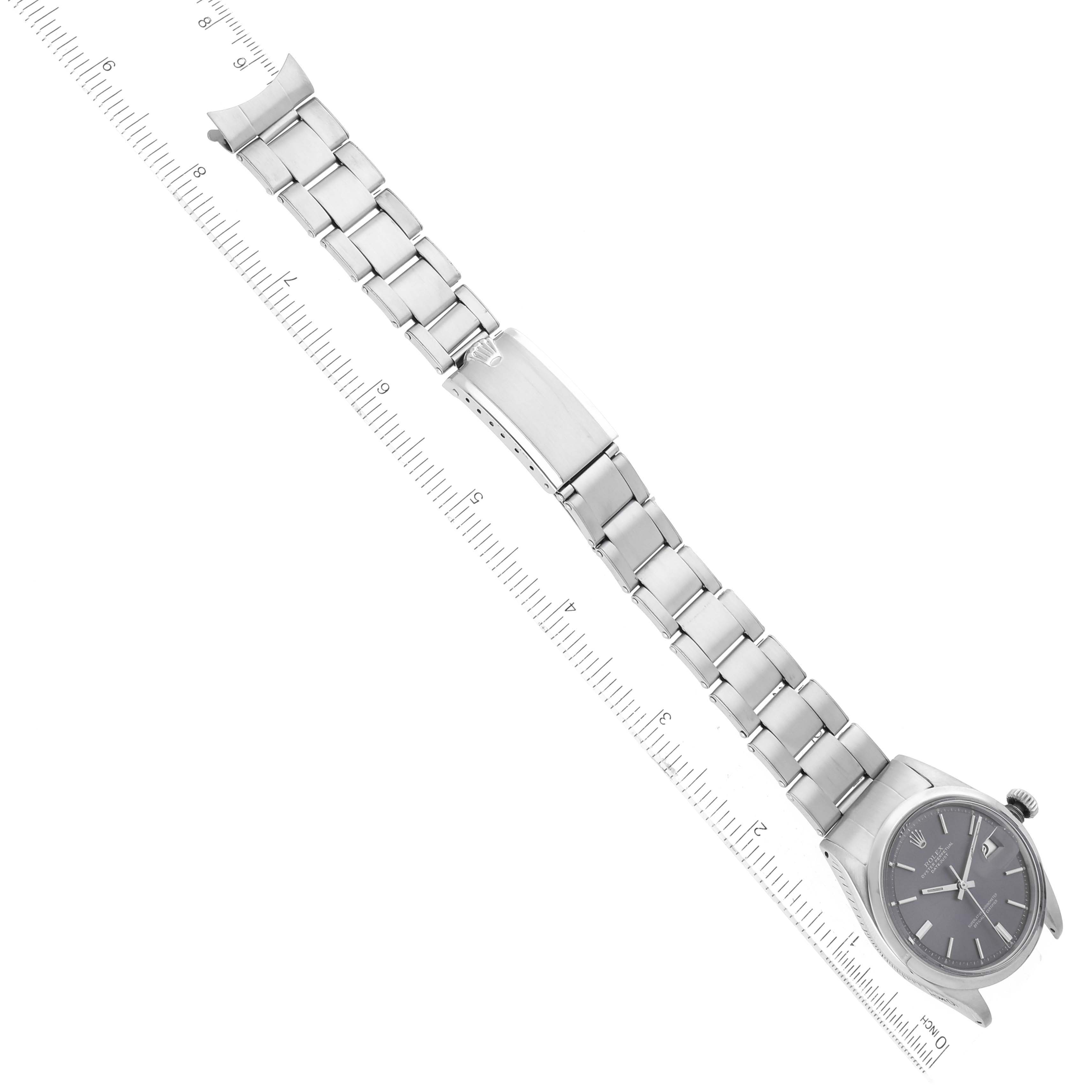 The image shows a Rolex Vintage Collection 1600 Men's Stainless Steel Grey Dial 1600 Men's Stainless Steel Grey Dial watch laid flat, displaying the full length of the band and face from an overhead angle.