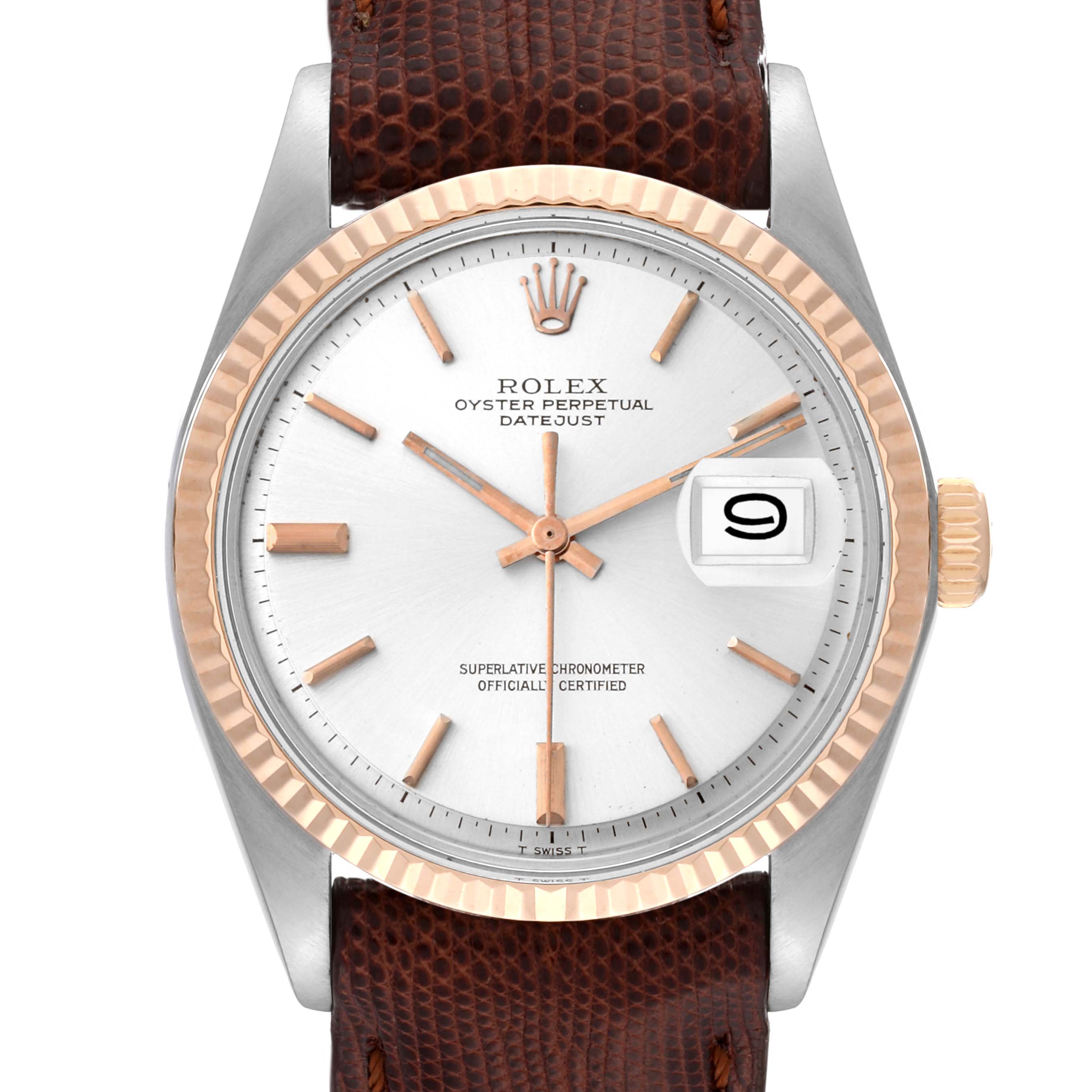 The image shows a close-up of the face of a Rolex Vintage Collection 1601 Men's Steel and Gold (two tone) Silver Dial 1601 Men's Steel and Gold (two tone) Silver Dial Datejust watch, displaying its dial, hands, bezel, and crown.