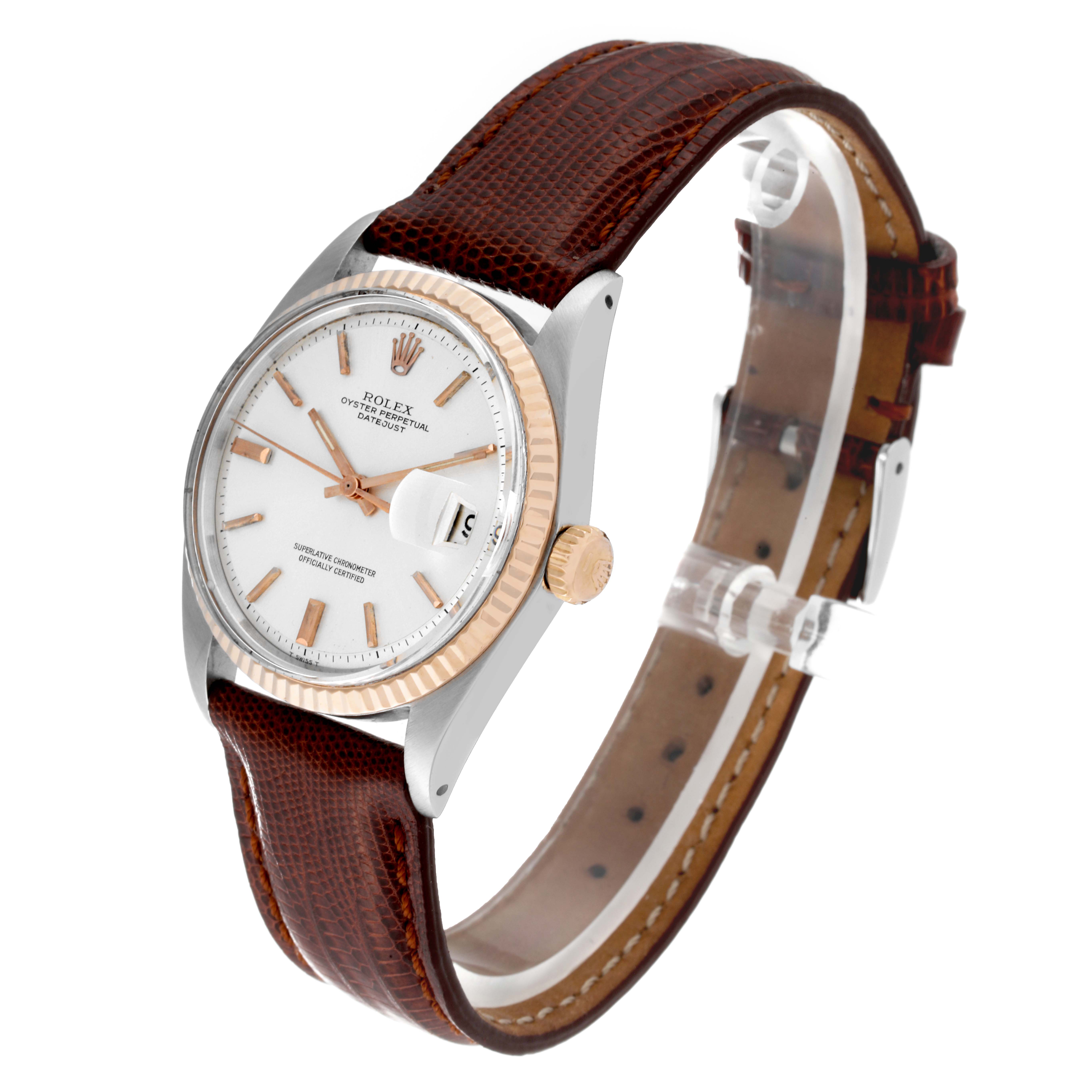 The Rolex Vintage Collection 1601 Men's Steel and Gold (two tone) Silver Dial 1601 Men's Steel and Gold (two tone) Silver Dial model is shown at a slight angle, highlighting its face, crown, and brown leather strap.