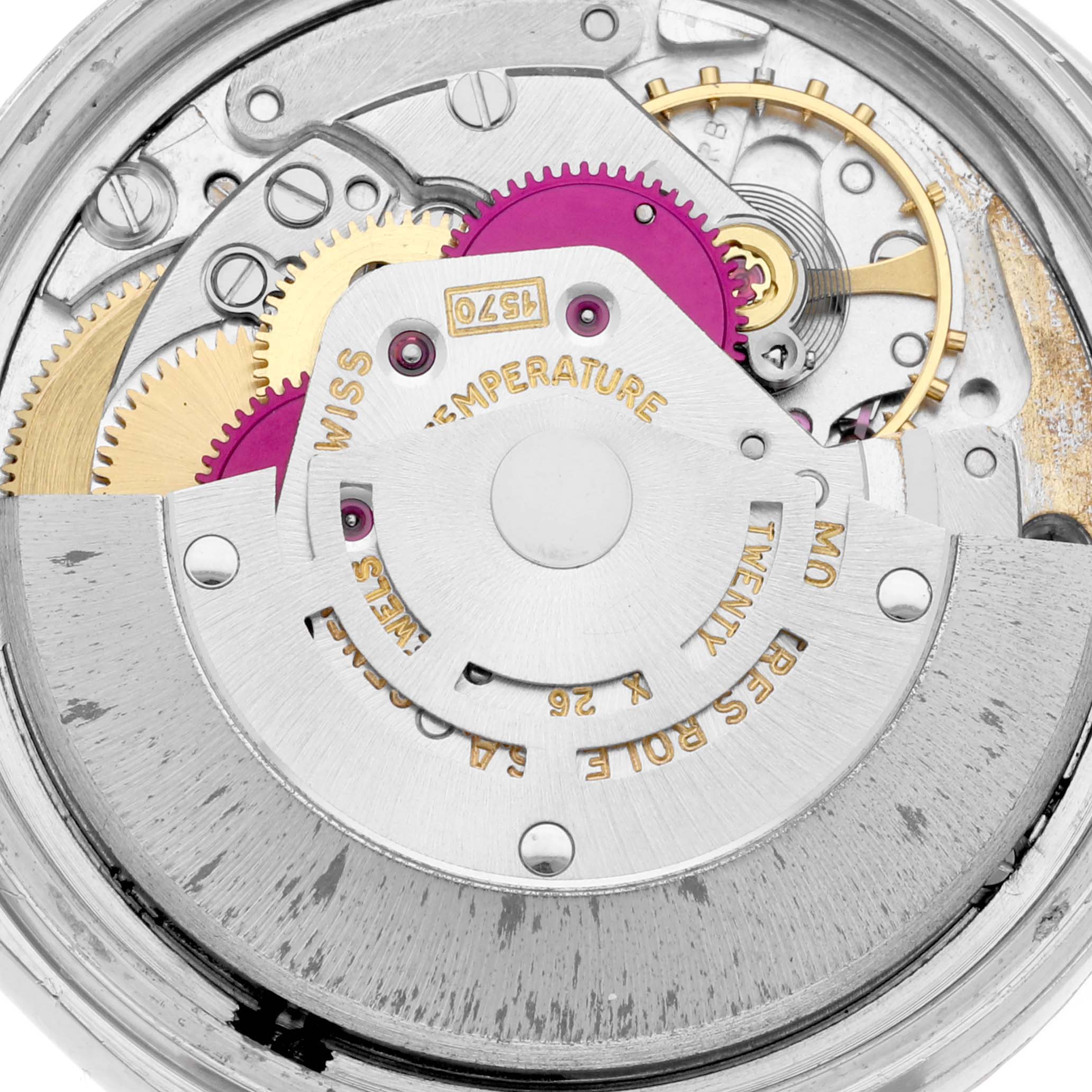 This image shows a close-up view of the internal mechanical parts and gears of the Rolex Vintage Collection 1601 Men's Steel and Gold (two tone) Silver Dial 1601 Men's Steel and Gold (two tone) Silver Dial watch.