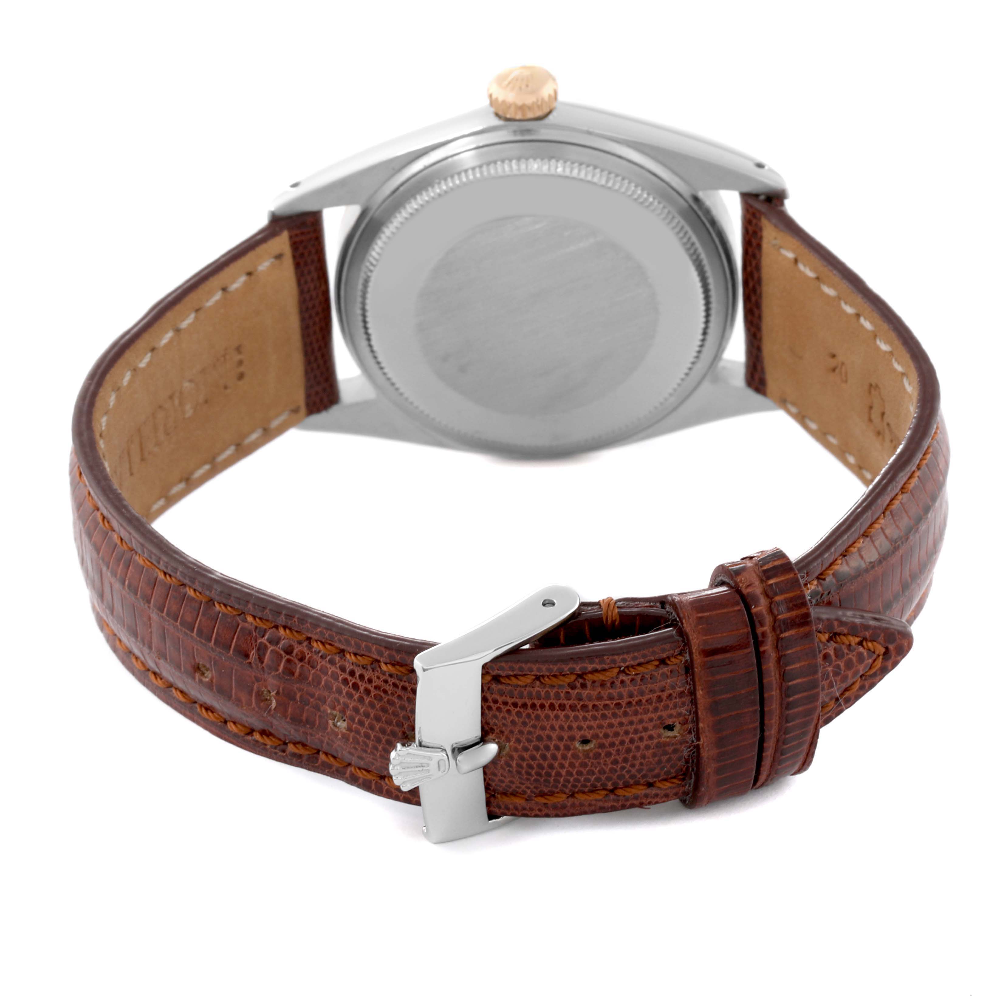 The image shows the back case, crown, and brown leather strap with buckle of the Rolex Vintage Collection 1601 Men's Steel and Gold (two tone) Silver Dial 1601 Men's Steel and Gold (two tone) Silver Dial watch.