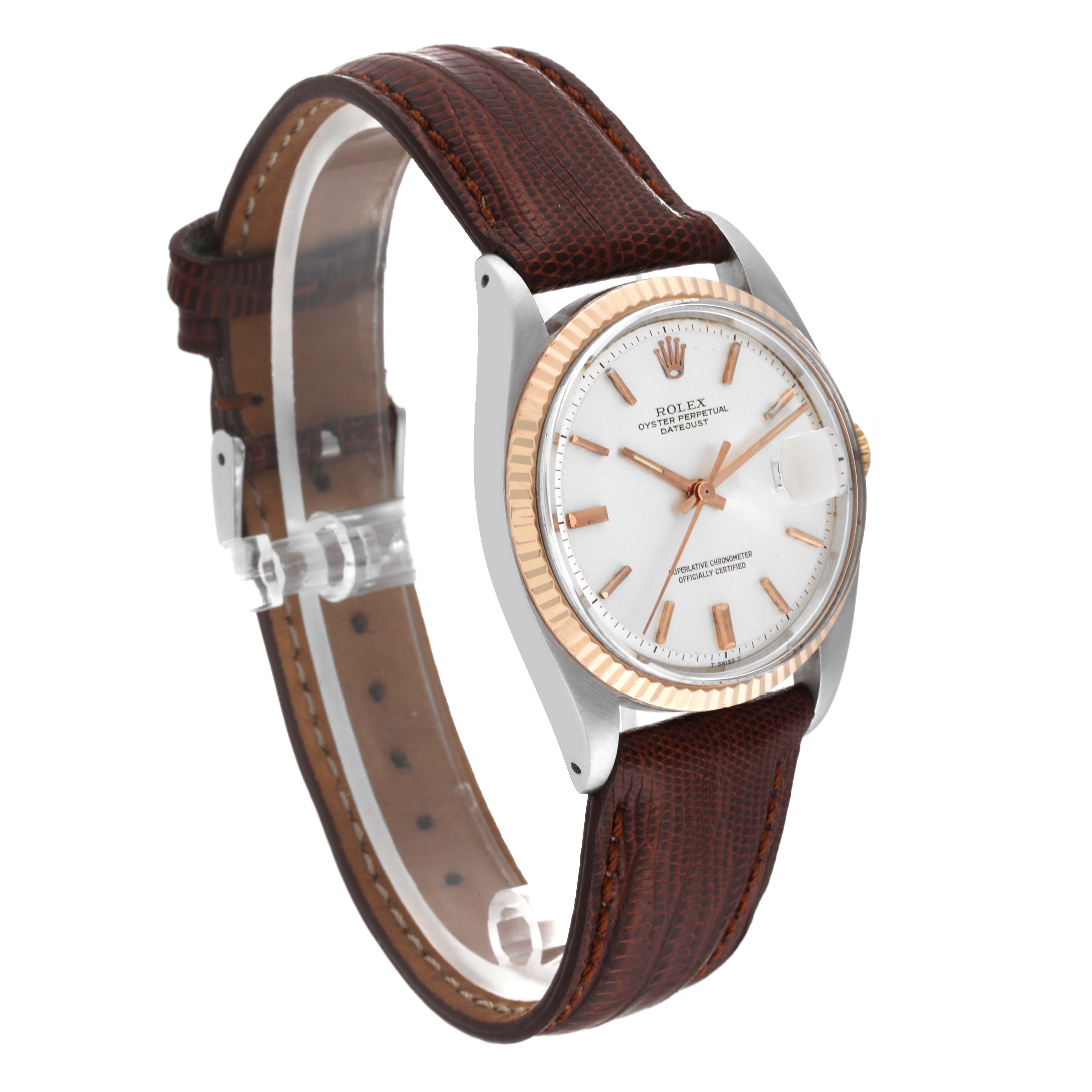 The image shows a side angle of the Rolex Vintage Collection 1601 Men's Steel and Gold (two tone) Silver Dial 1601 Men's Steel and Gold (two tone) Silver Dial watch, highlighting the face, bezel, and brown leather strap.