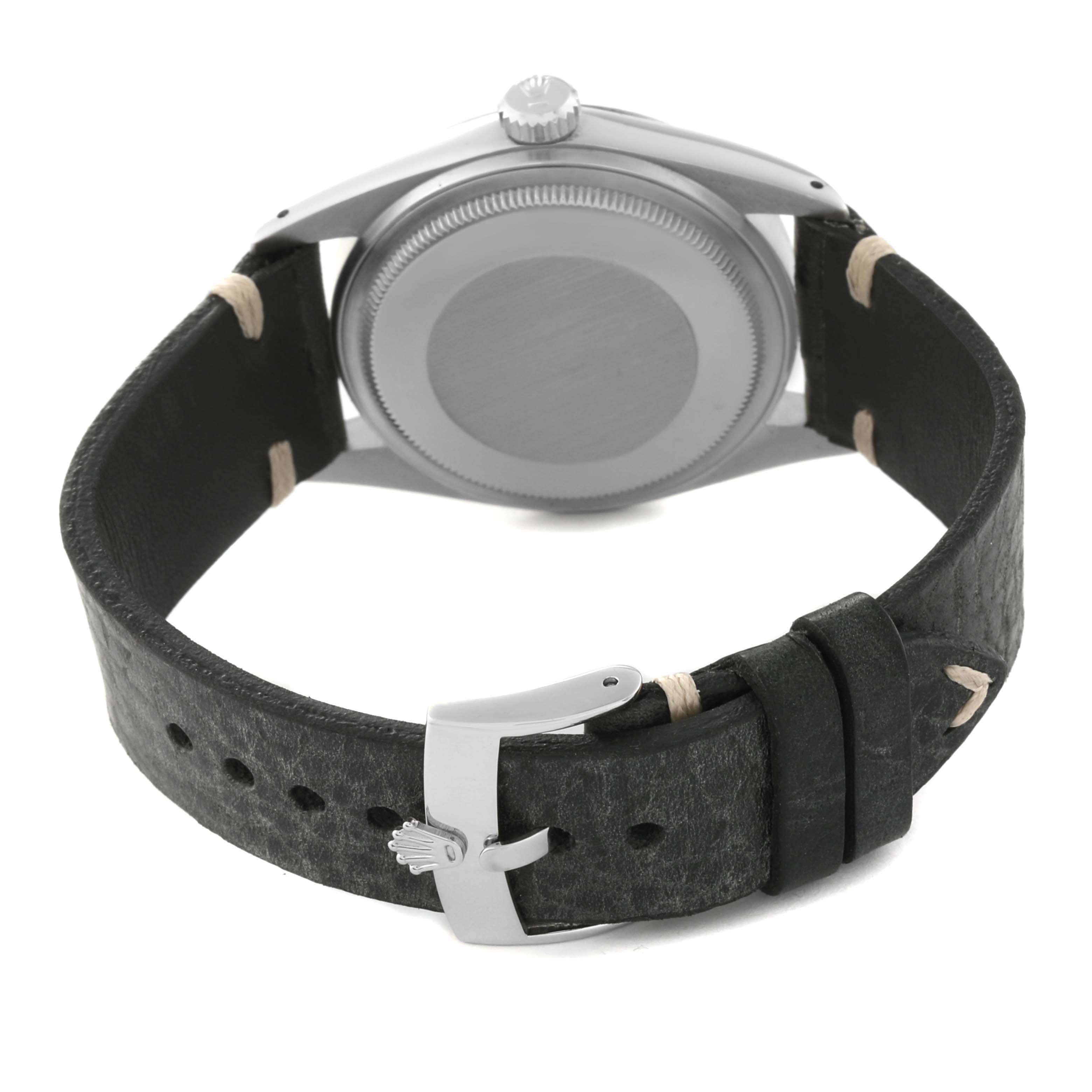 The image shows the back and leather strap of the Rolex Vintage Collection 16014 Men's Stainless Steel Silver Dial 16014 Men's Stainless Steel Silver Dial watch.