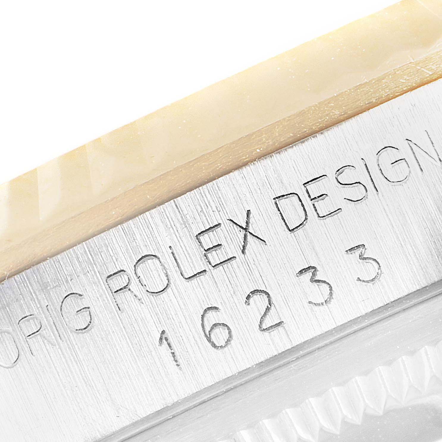 The image shows a close-up of the case side of a Rolex Datejust 16233 Men's Steel and Gold (two tone) Champagne Dial 16233 Men's Steel and Gold (two tone) Champagne Dial, including the etched text "ORIG ROLEX DESIGN 16233."