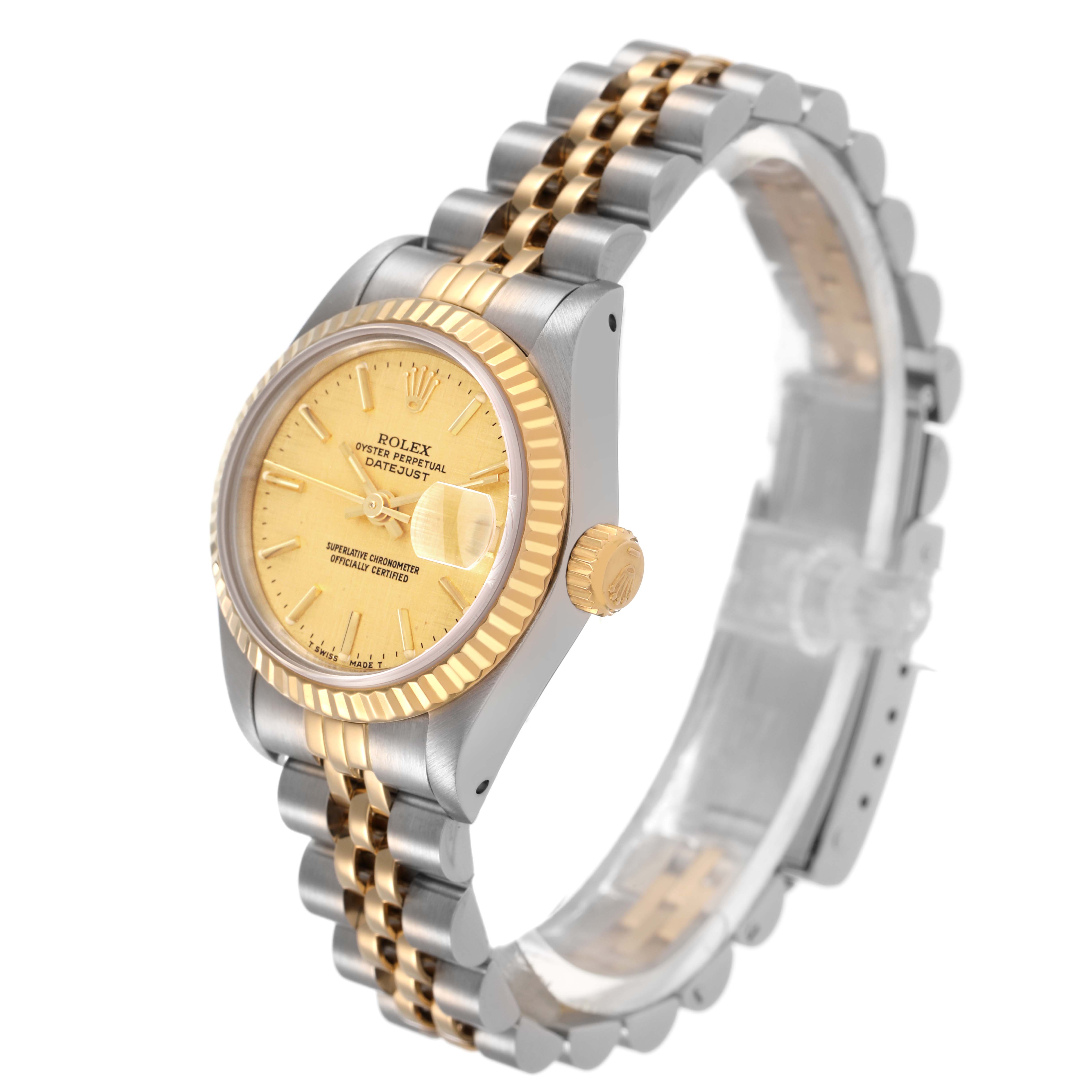 The Rolex Datejust 69173 Women's Steel and Gold (two tone) Champagne Dial watch is shown at a three-quarter angle, highlighting the gold and silver bracelet, fluted bezel, and champagne dial.