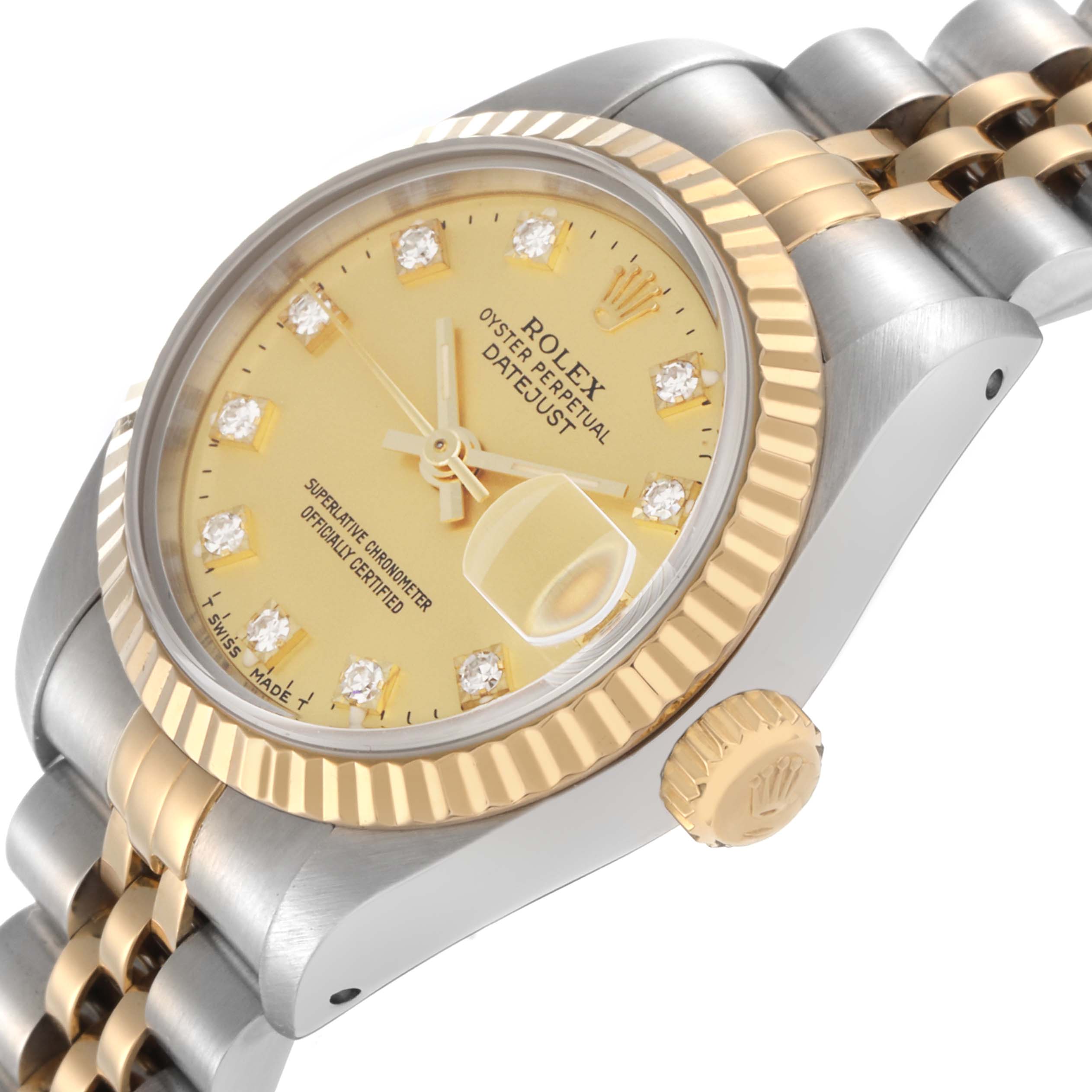 The Rolex Datejust 69173 Women's Steel and Gold (two tone) Champagne Dial 69173 Women's Steel and Gold (two tone) Champagne Dial watch is shown at an angle highlighting the gold and stainless steel case, dial, fluted bezel, and bracelet.