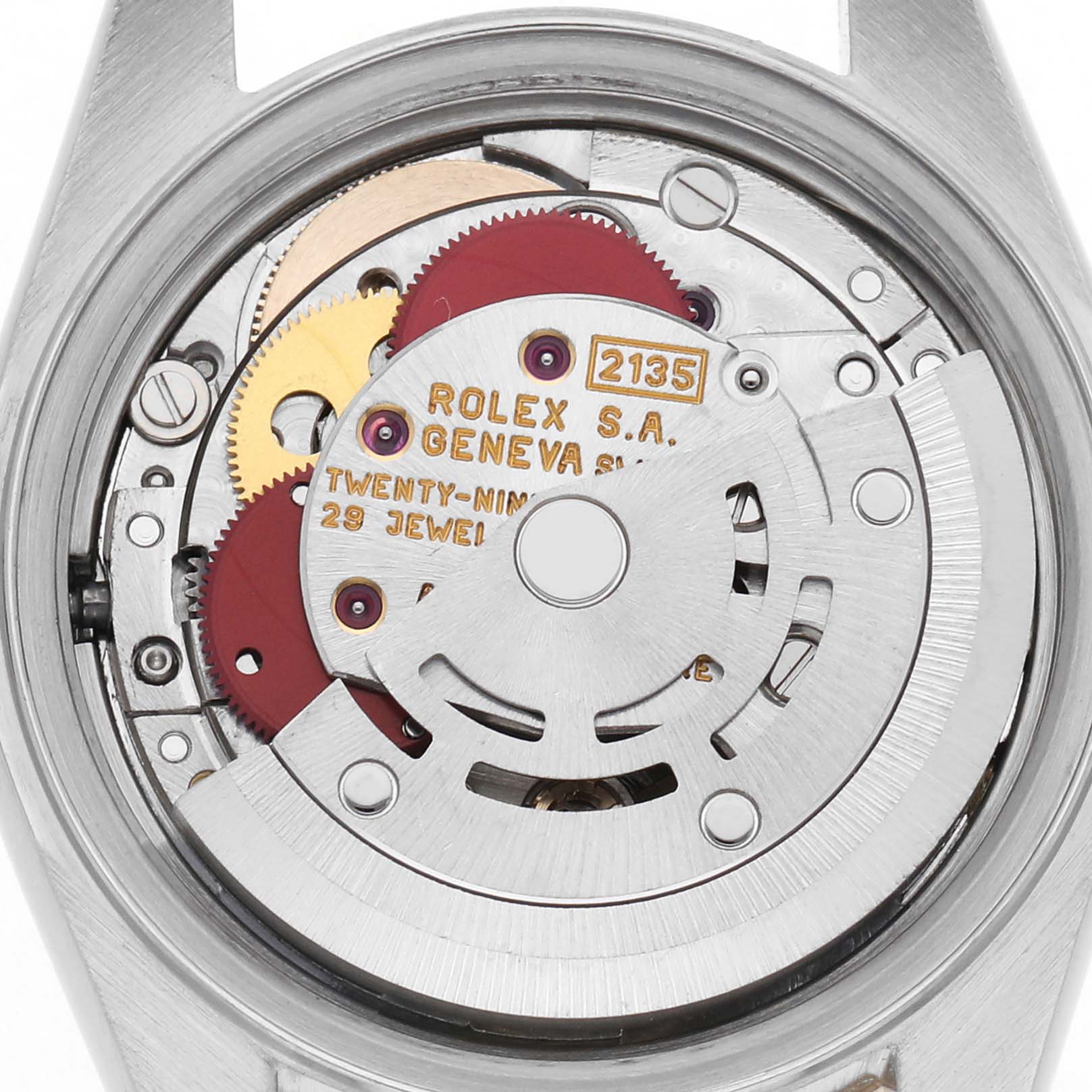 The image shows the internal movement of a Rolex Datejust 69173 Women's Steel and Gold (two tone) Champagne Dial 69173 Women's Steel and Gold (two tone) Champagne Dial watch from a rear angle, highlighting the gears and rotor.