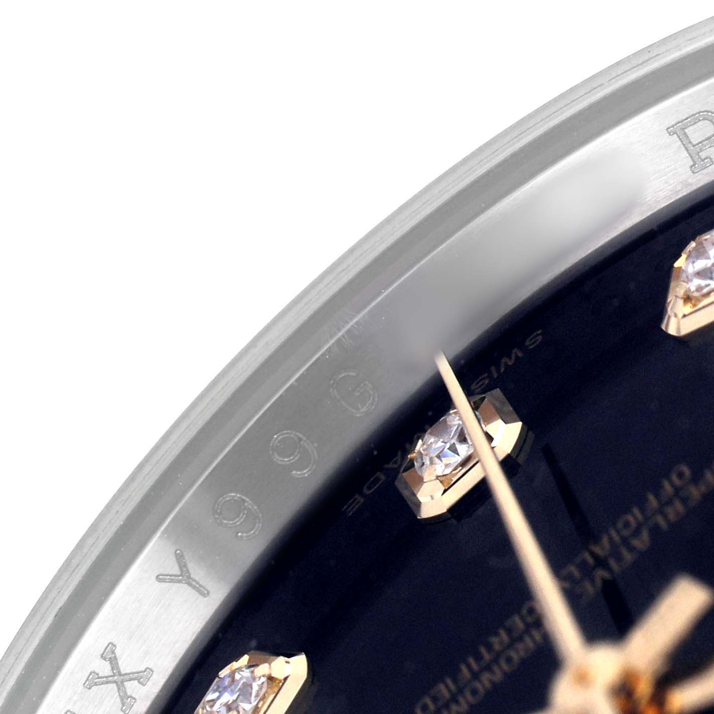 The image shows a close-up of the dial and diamond markers of a Rolex Datejust 116243 Men's Steel and Gold (two tone) Black Dial watch.
