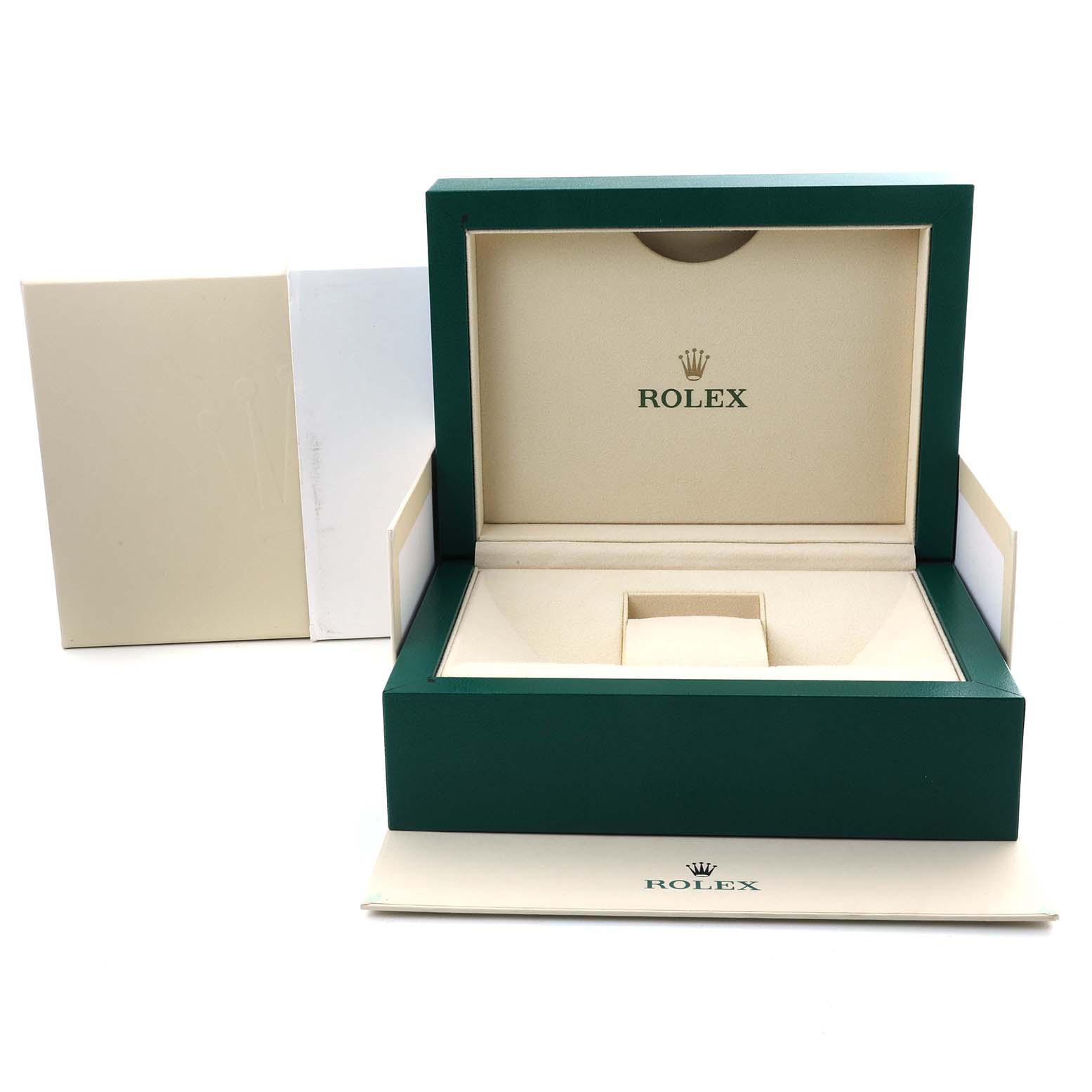 The image shows the open presentation box of a Rolex Datejust 116243 Men's Steel and Gold (two tone) Black Dial, featuring its green exterior and plush interior.
