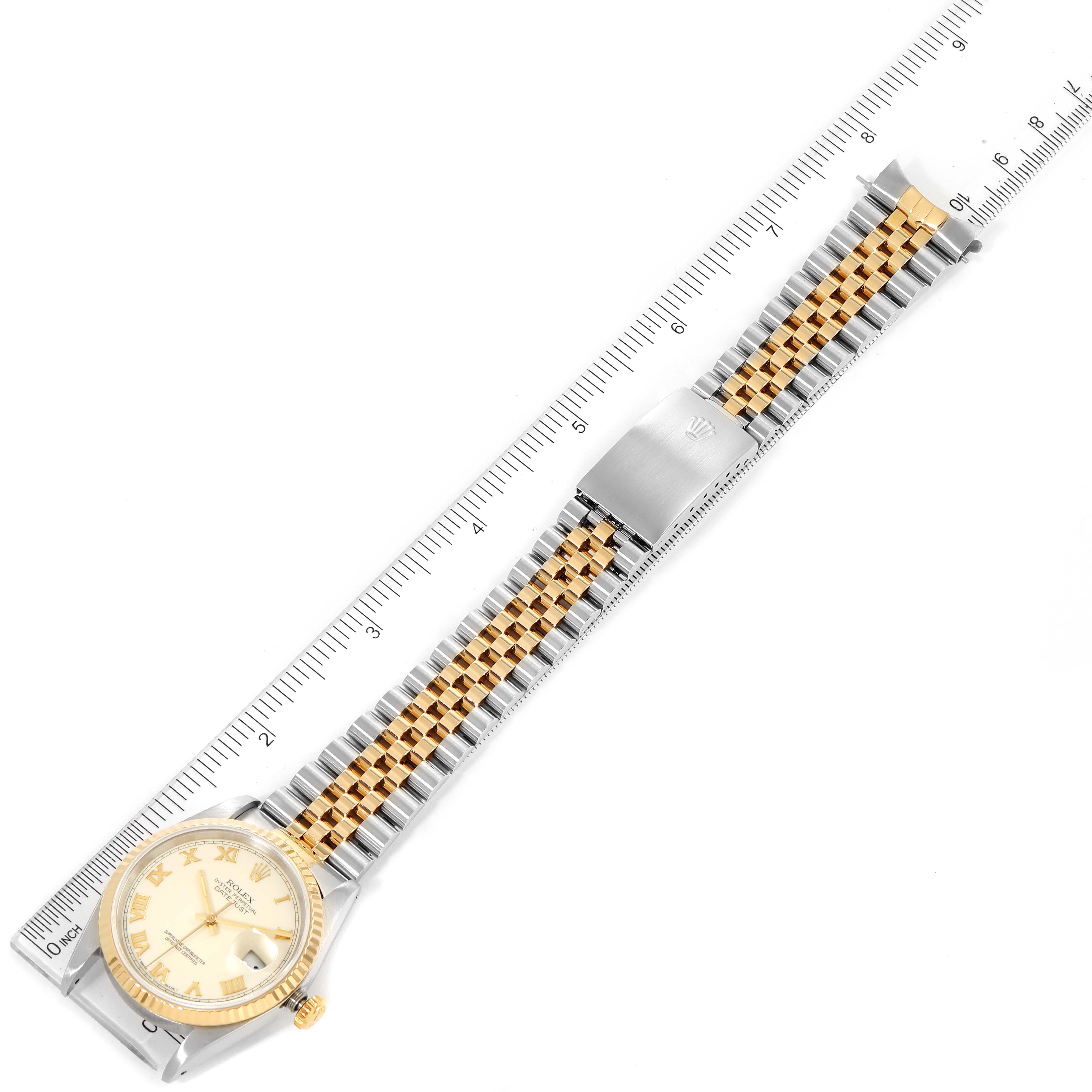 The image shows a Rolex Datejust 16233 Men's Steel and Gold (two tone) Beige Dial 16233 Men's Steel and Gold (two tone) Beige Dial watch laid flat with the dial, bezel, bracelet, and clasp aligned with a ruler.