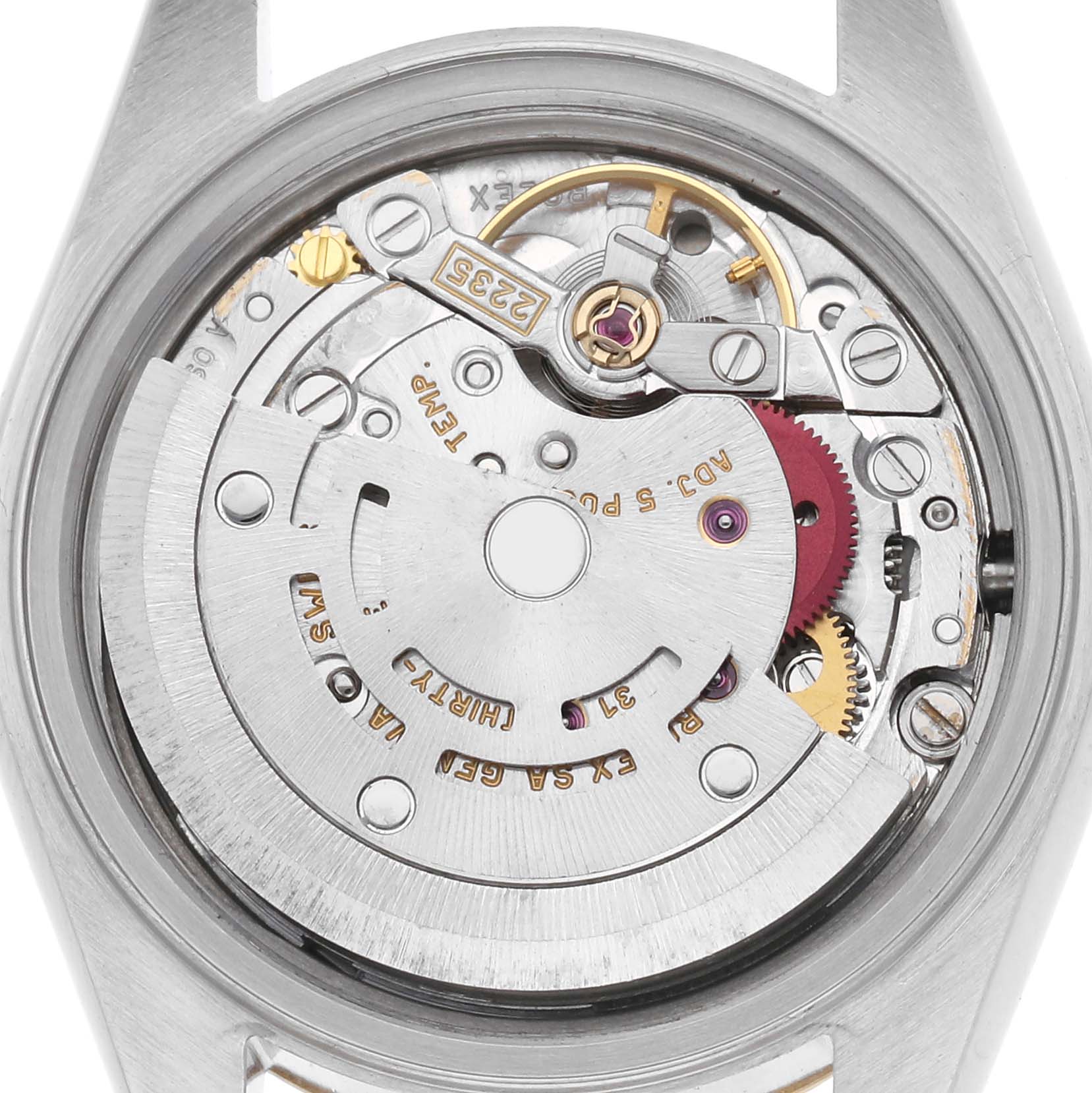 The image shows the movement of a Rolex Datejust 79173 Women's Steel and Gold (two tone) White Dial 79173 Women's Steel and Gold (two tone) White Dial watch from the back, highlighting gears and the rotor.