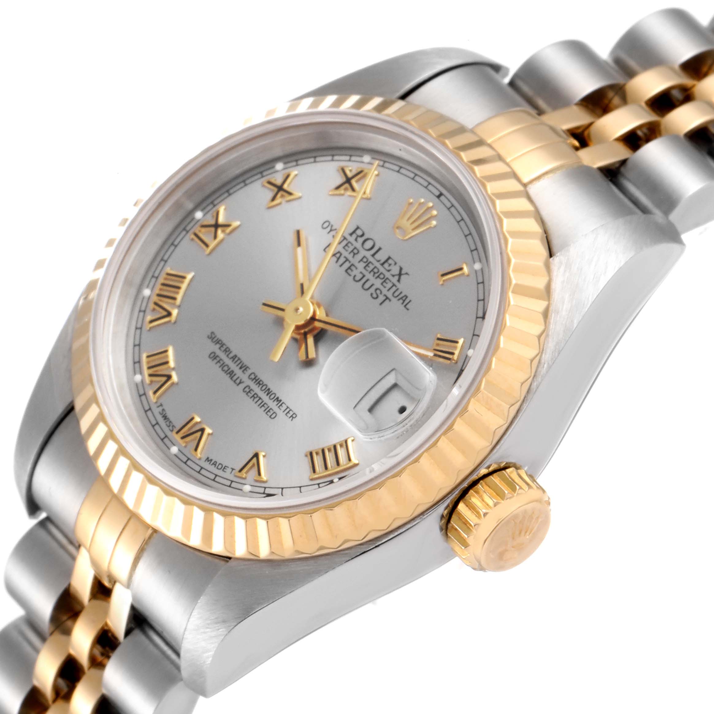 The image shows a close-up of the Rolex Datejust 69173 Women
s Steel and Gold (two tone) Silver Dial 69173 Women
s Steel and Gold (two tone) Silver Dial watch
s face, including its bezel, crown, and part of the bracelet.