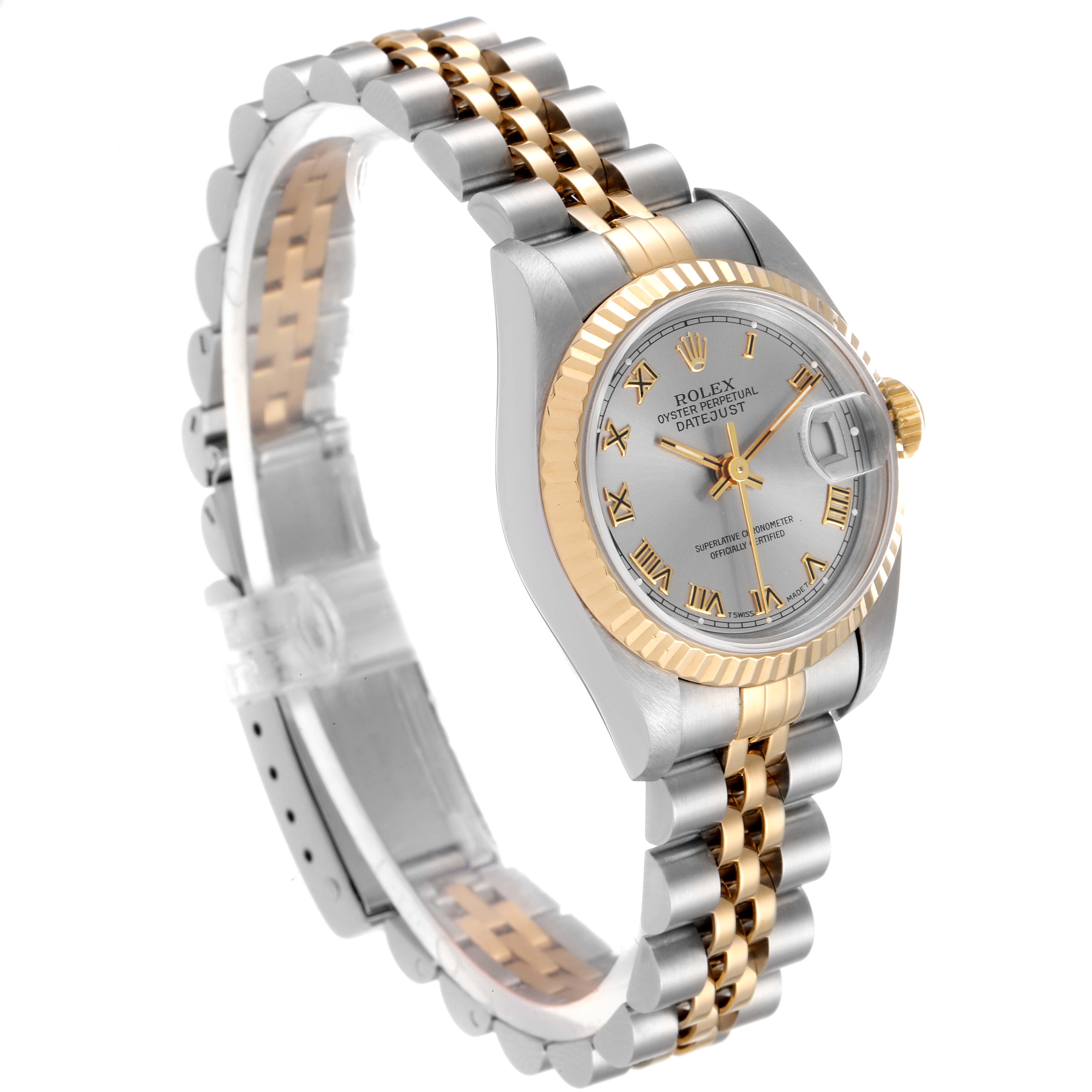 The image shows a Rolex Datejust 69173 Women
s Steel and Gold (two tone) Silver Dial 69173 Women
s Steel and Gold (two tone) Silver Dial watch from a three-quarter angle, highlighting the two-tone bracelet and silver dial with gold accents.